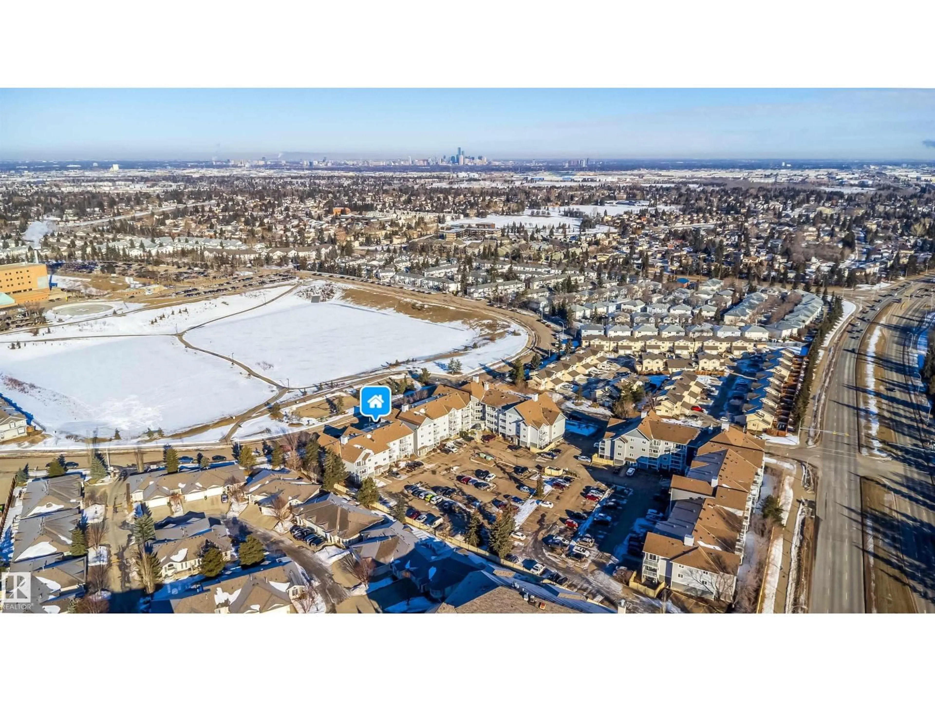 A pic from outside/outdoor area/front of a property/back of a property/a pic from drone, street for #213 - 5065 31 AV NW, Edmonton Alberta T6L6S5