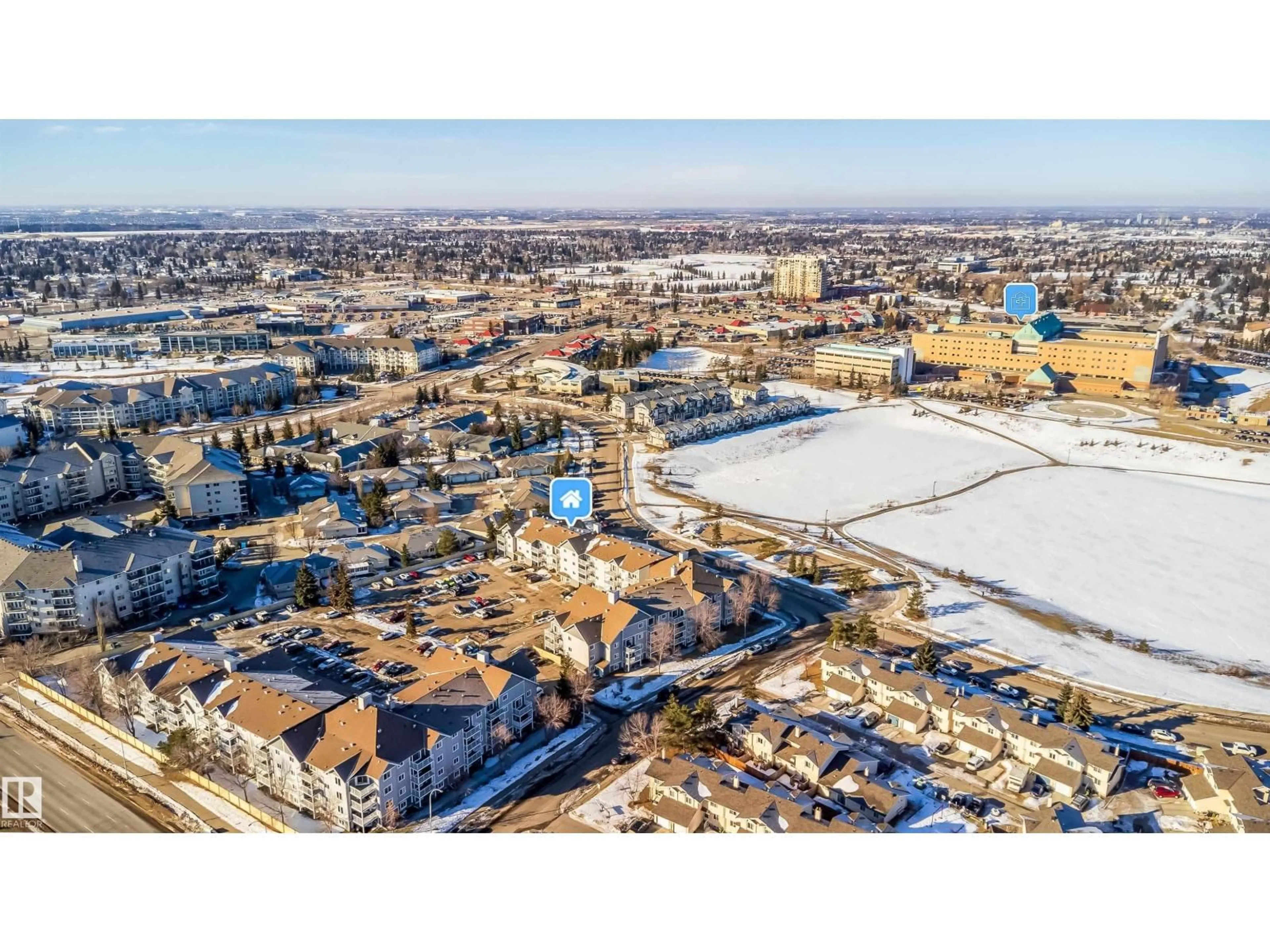 A pic from outside/outdoor area/front of a property/back of a property/a pic from drone, street for #213 - 5065 31 AV NW, Edmonton Alberta T6L6S5