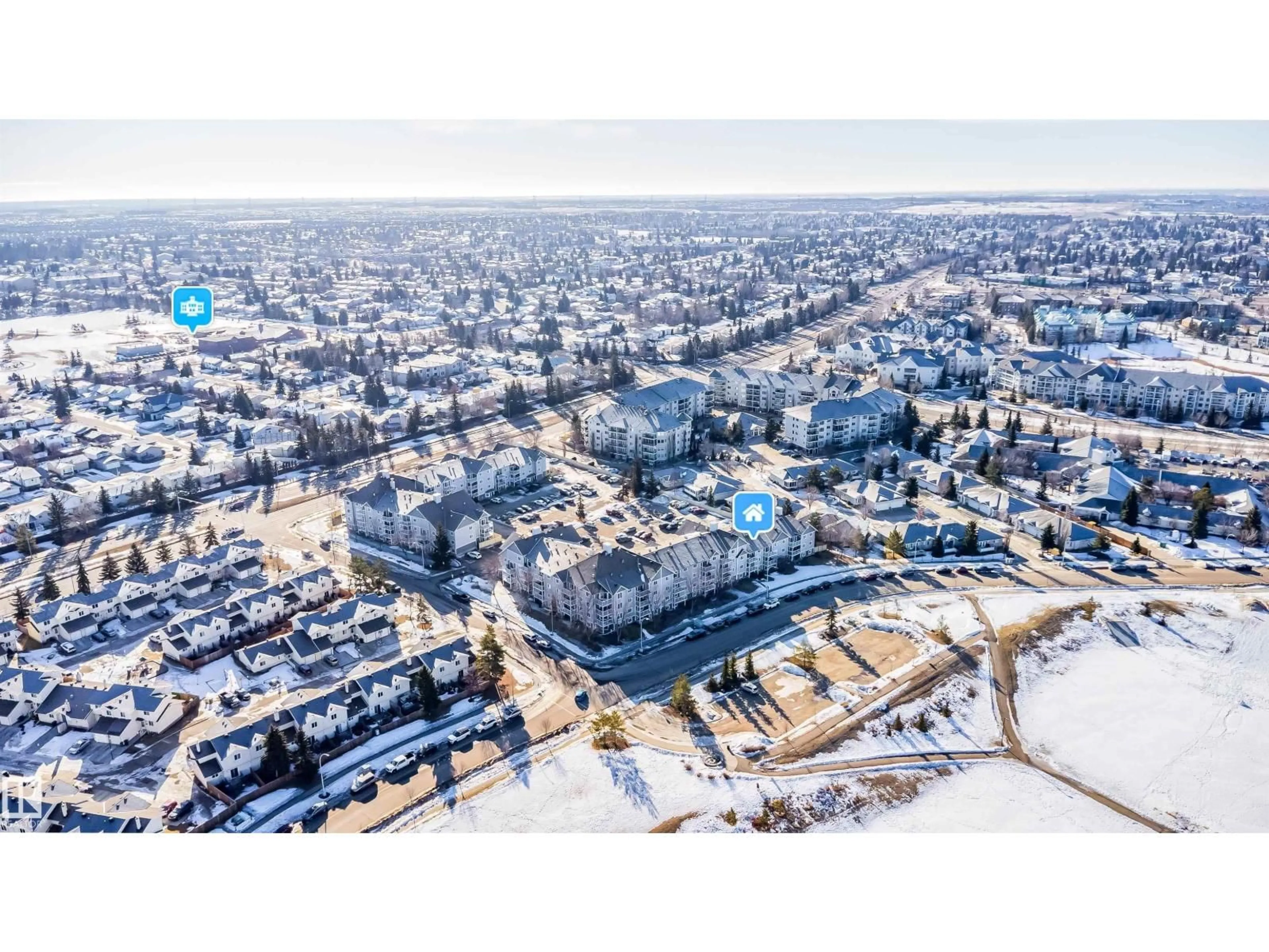 A pic from outside/outdoor area/front of a property/back of a property/a pic from drone, street for #213 - 5065 31 AV NW, Edmonton Alberta T6L6S5