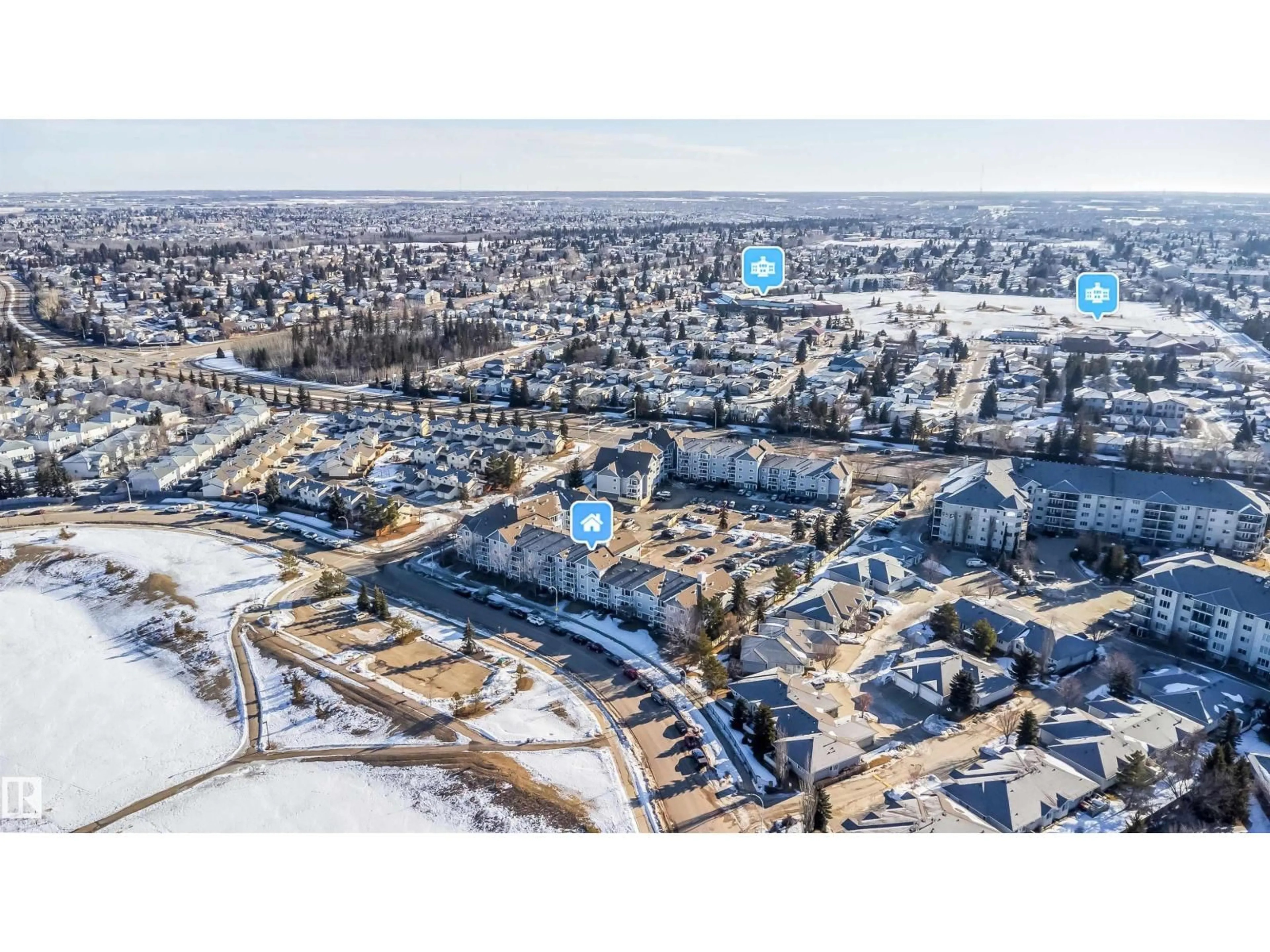 A pic from outside/outdoor area/front of a property/back of a property/a pic from drone, street for #213 - 5065 31 AV NW, Edmonton Alberta T6L6S5
