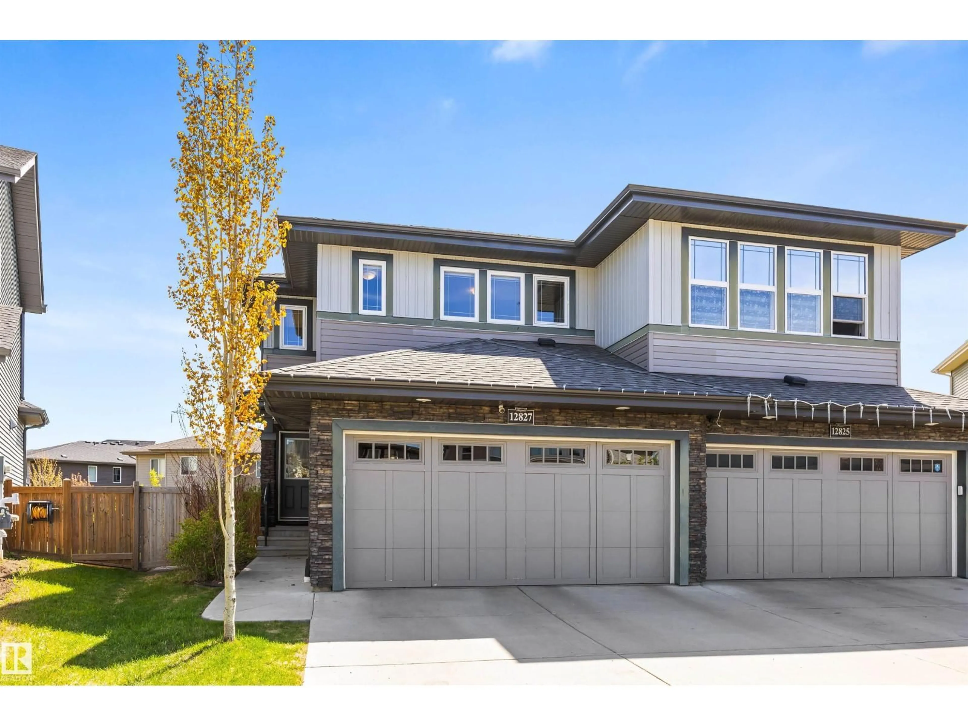Home with vinyl exterior material, street for 12827 207 ST, Edmonton Alberta T5S0K2