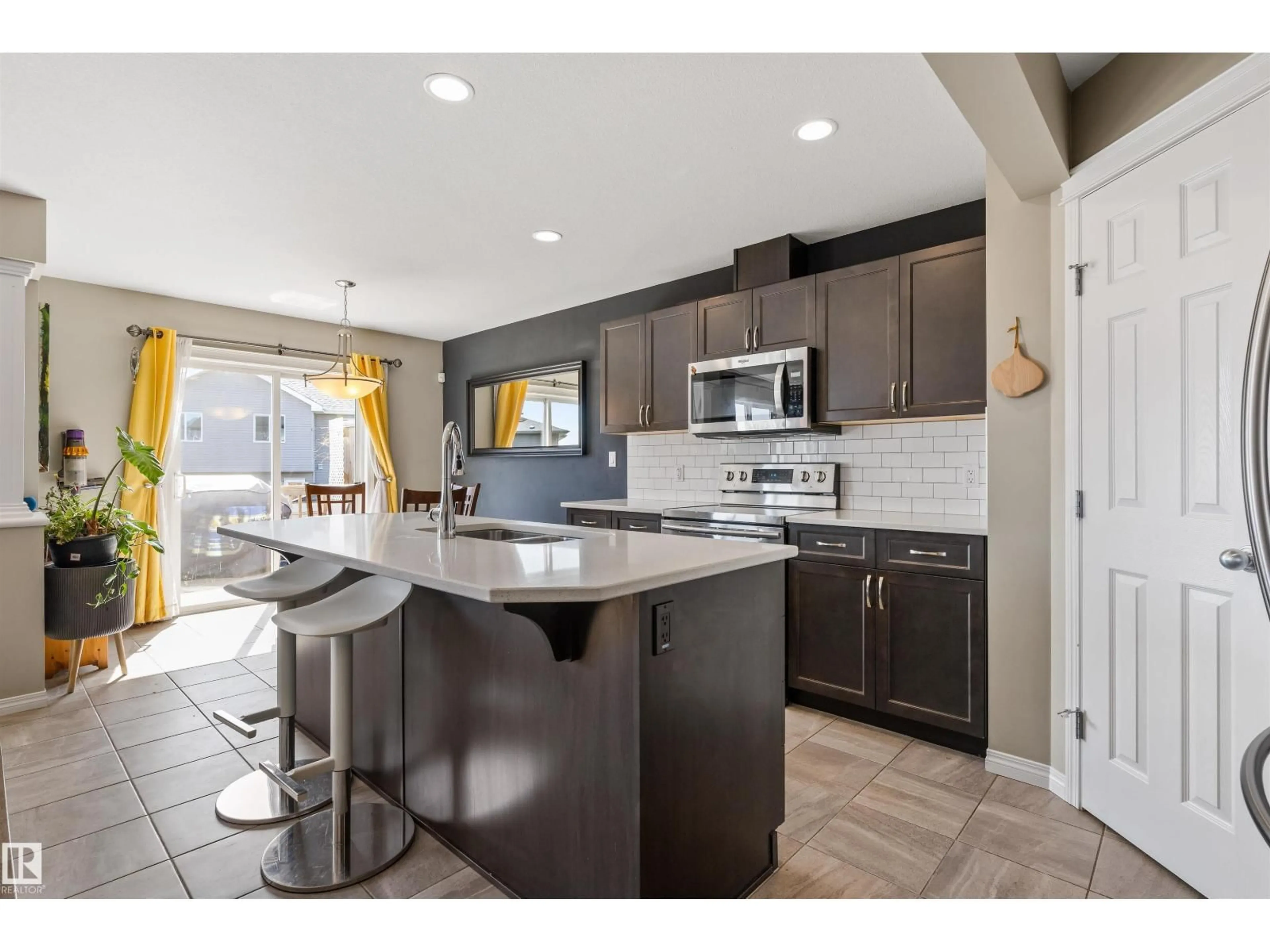 Open concept kitchen, ceramic/tile floor for 12827 207 ST, Edmonton Alberta T5S0K2