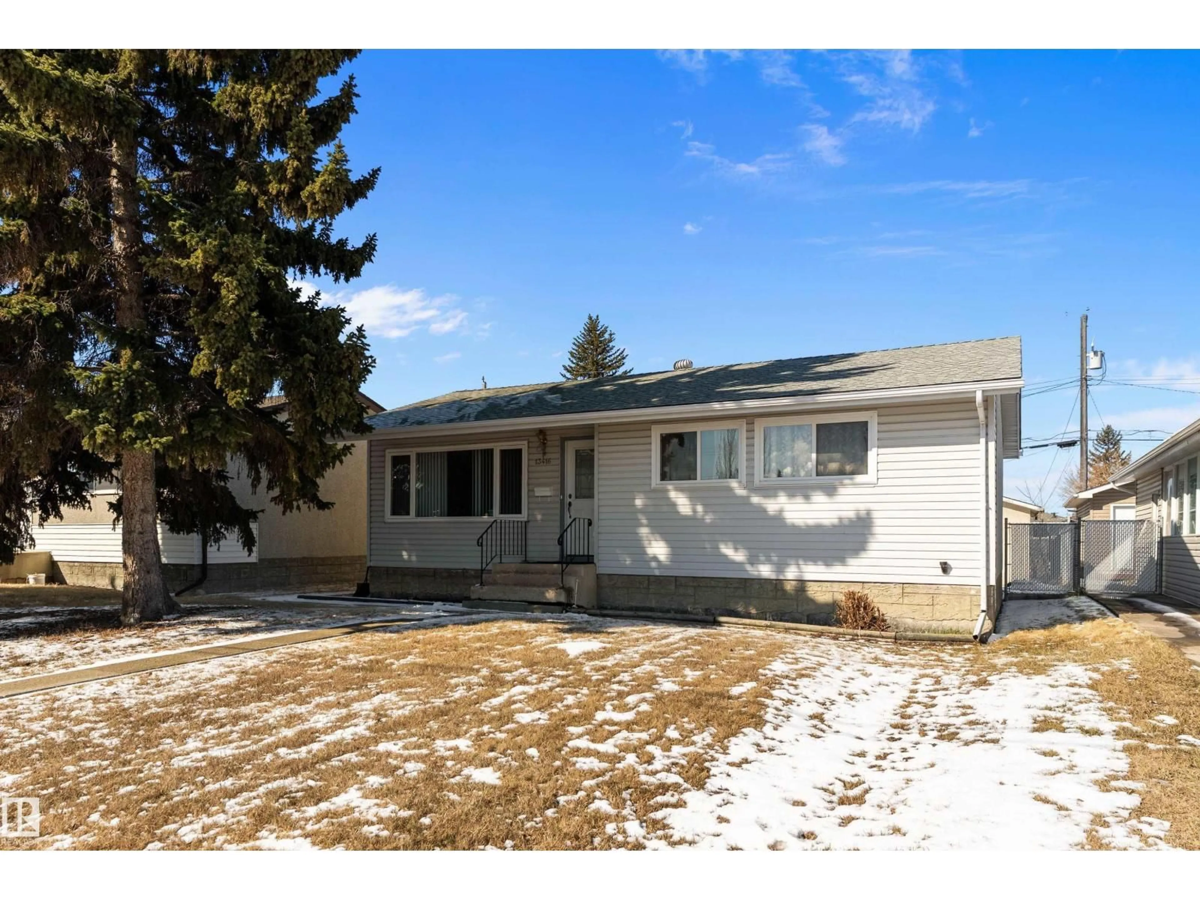 Home with vinyl exterior material, street for NW - 13416 101 ST, Edmonton Alberta T5E4G4