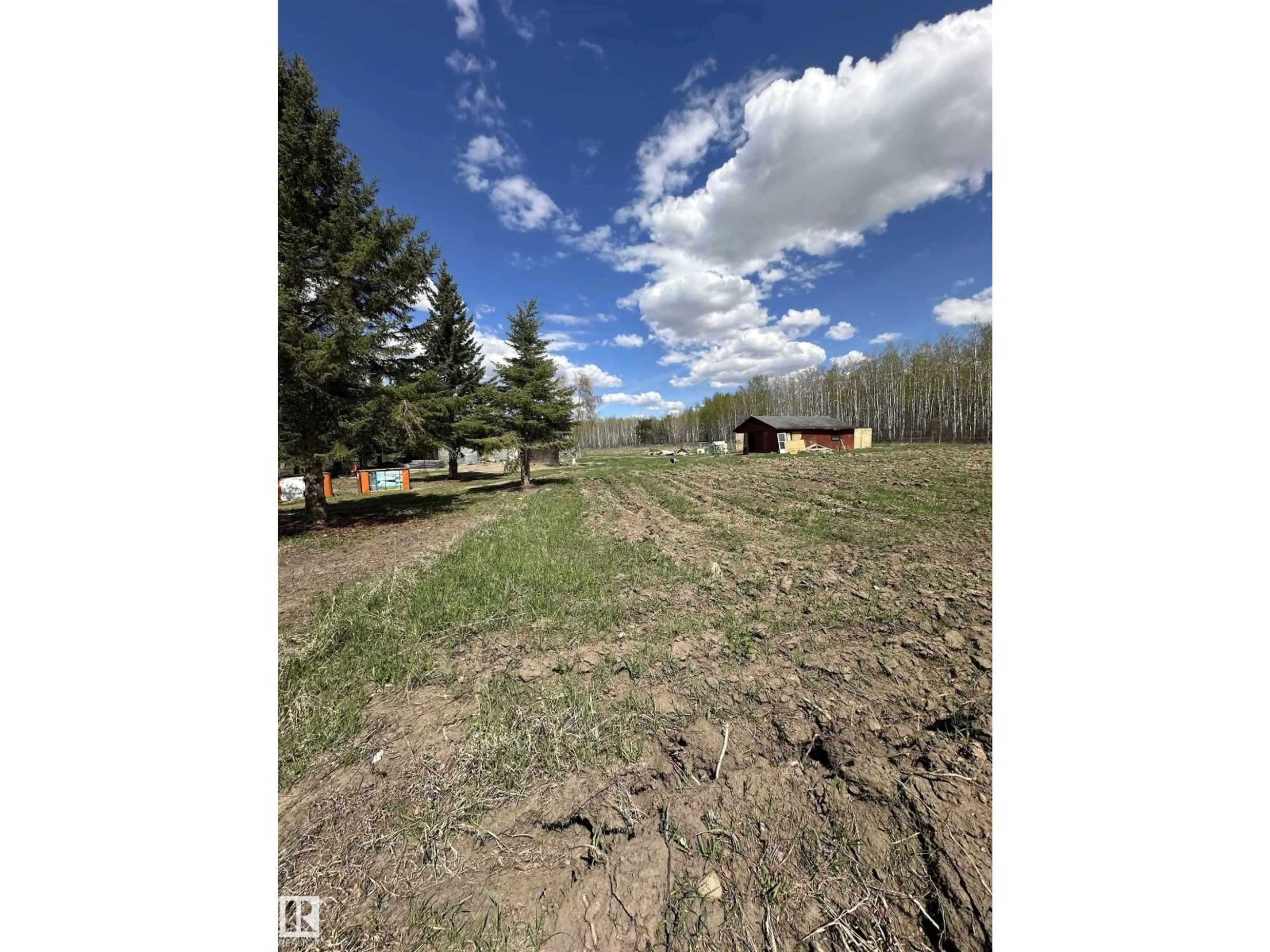 A pic from outside/outdoor area/front of a property/back of a property/a pic from drone, forest/trees view for 41 - 59419 RGE RD 240, Rural Westlock County Alberta T0G0P0