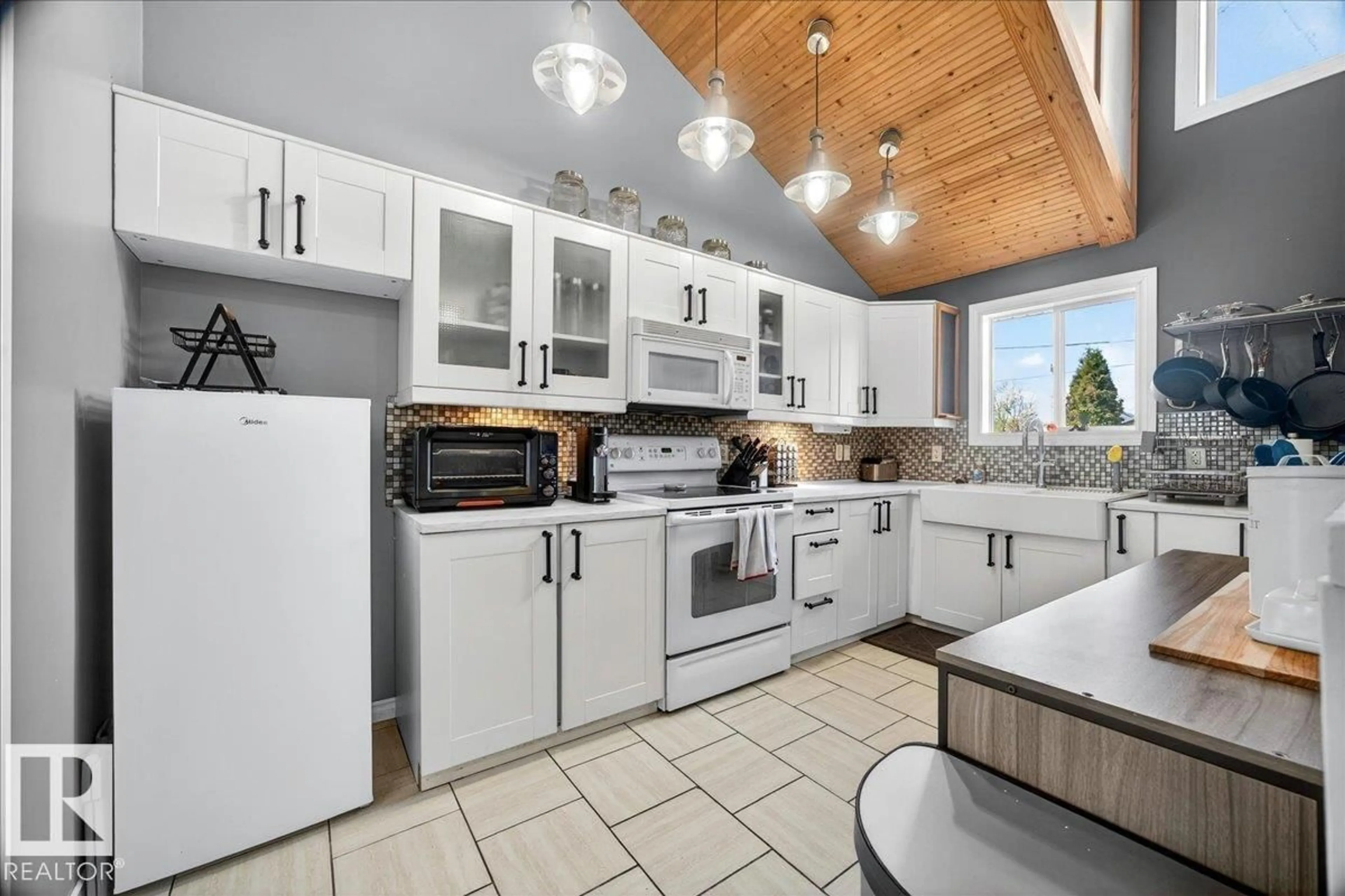 Open concept kitchen, ceramic/tile floor for 5040 52 ST, Andrew Alberta T0B0C0