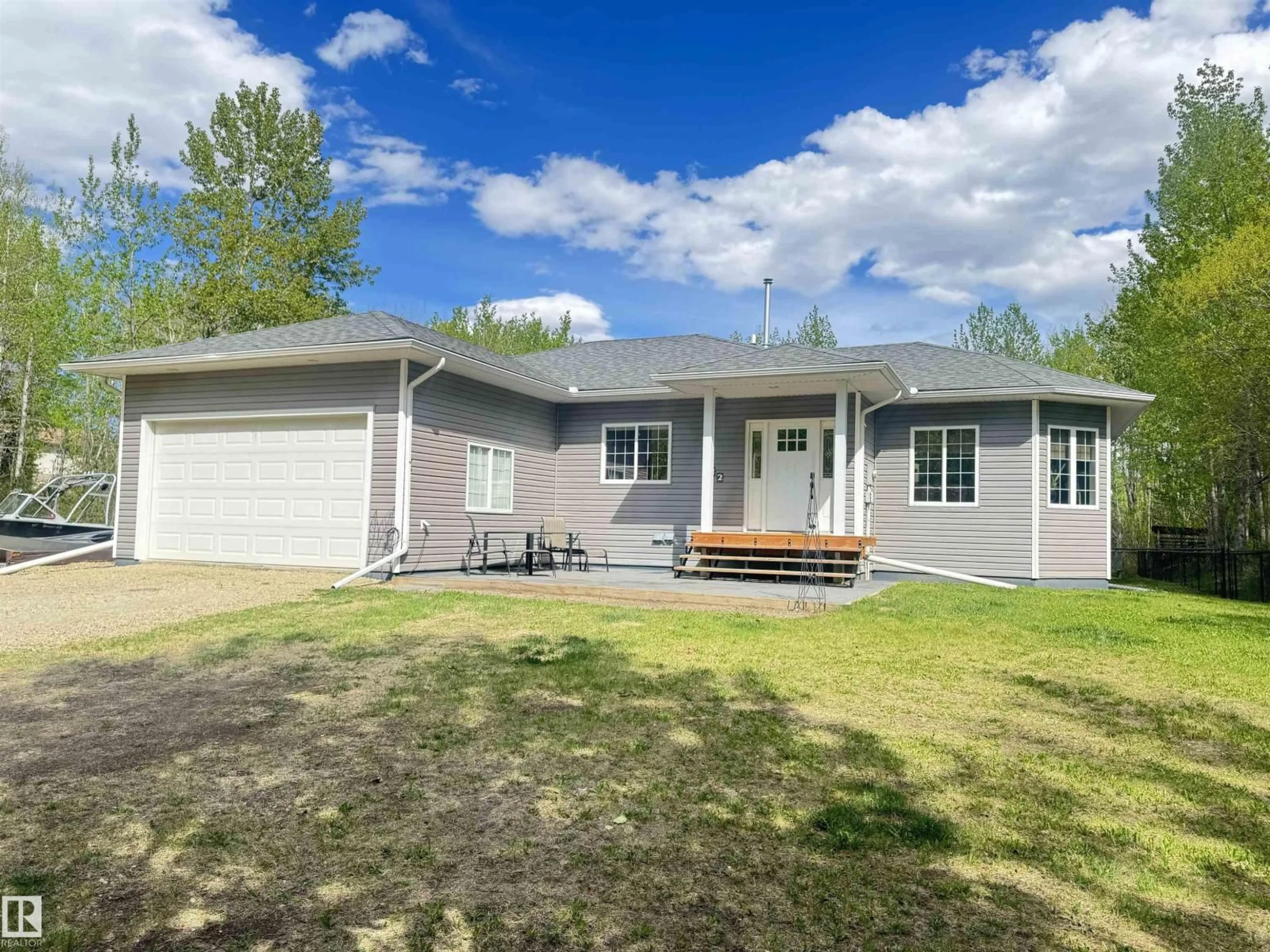A pic from outside/outdoor area/front of a property/back of a property/a pic from drone, street for 22 - 53407 RGE ROAD 30, Rural Parkland County Alberta T7Y0E4