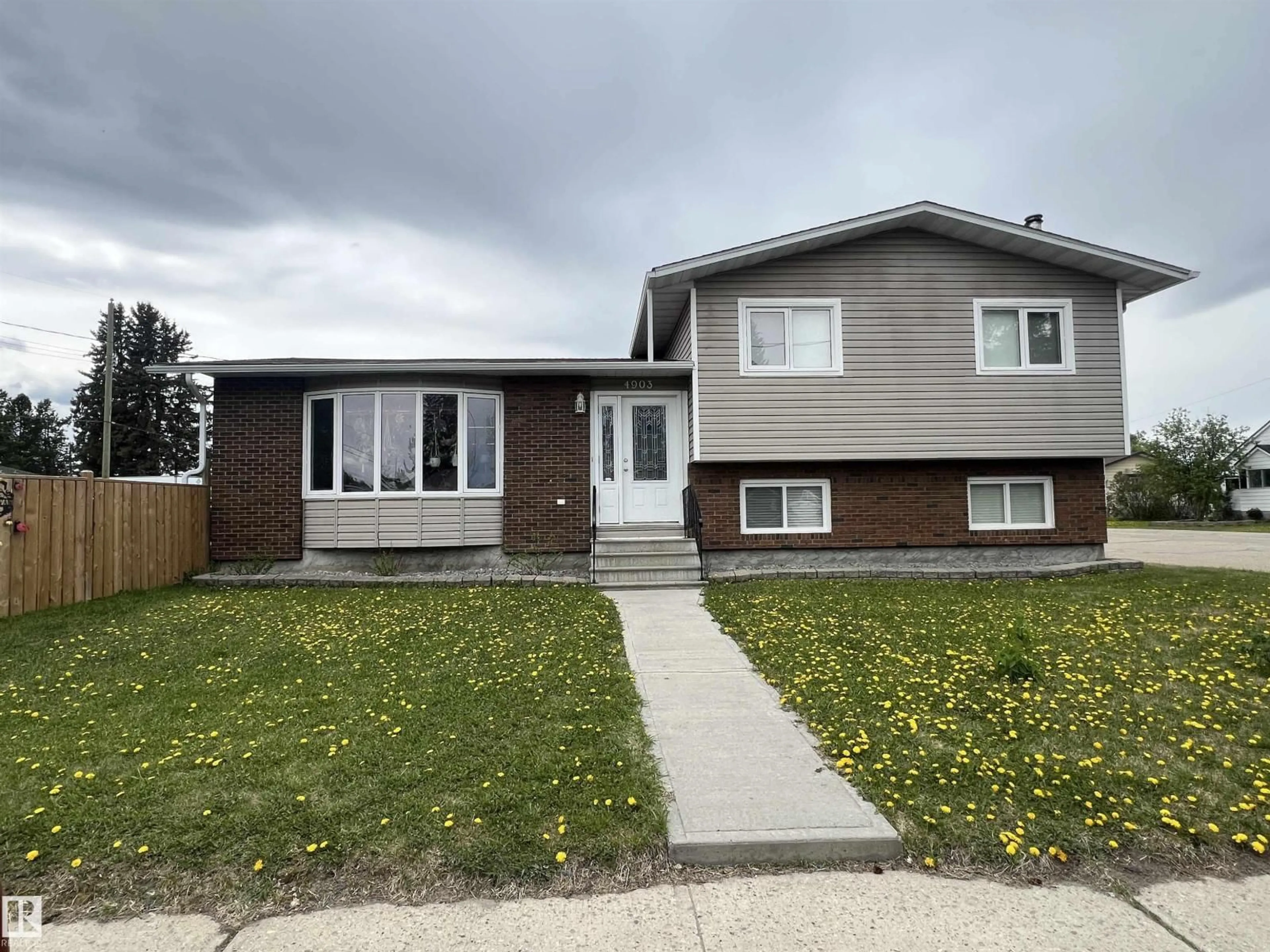 Home with vinyl exterior material, street for 4903 52 AV, Evansburg Alberta T0E0T0
