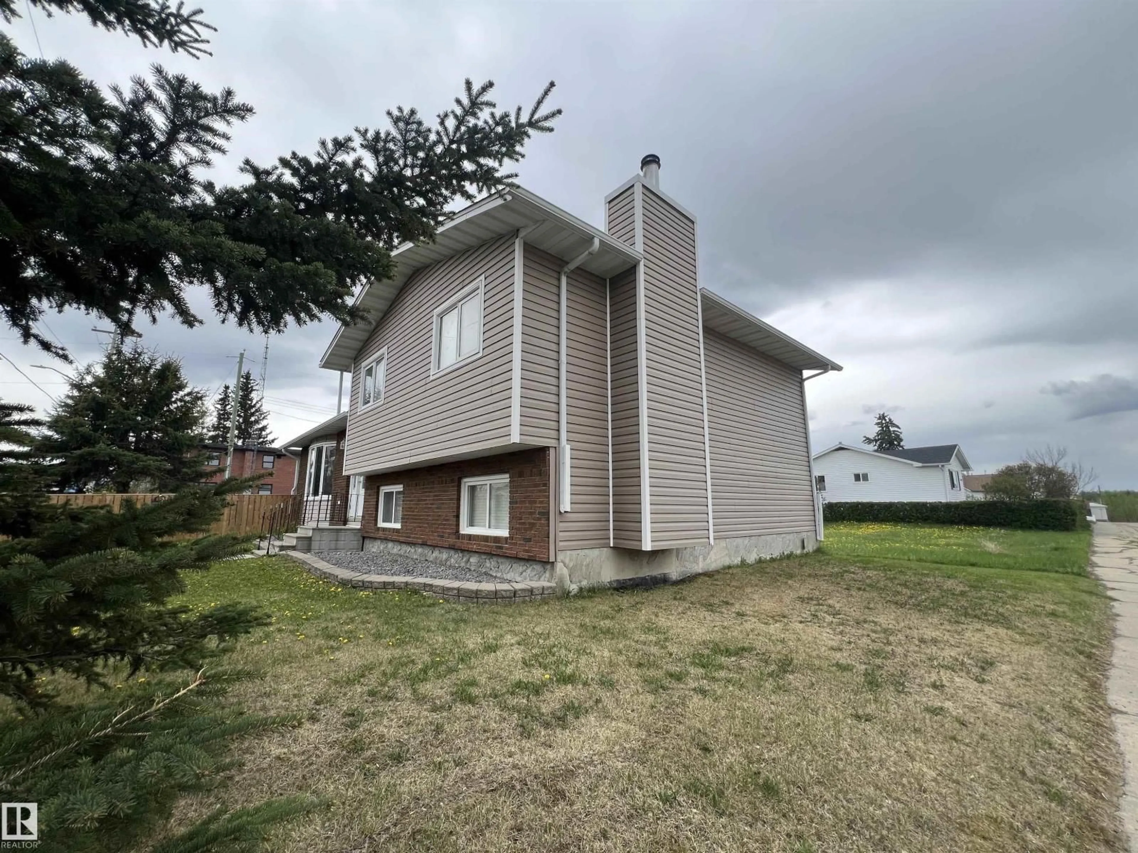 A pic from outside/outdoor area/front of a property/back of a property/a pic from drone, building for 4903 52 AV, Evansburg Alberta T0E0T0