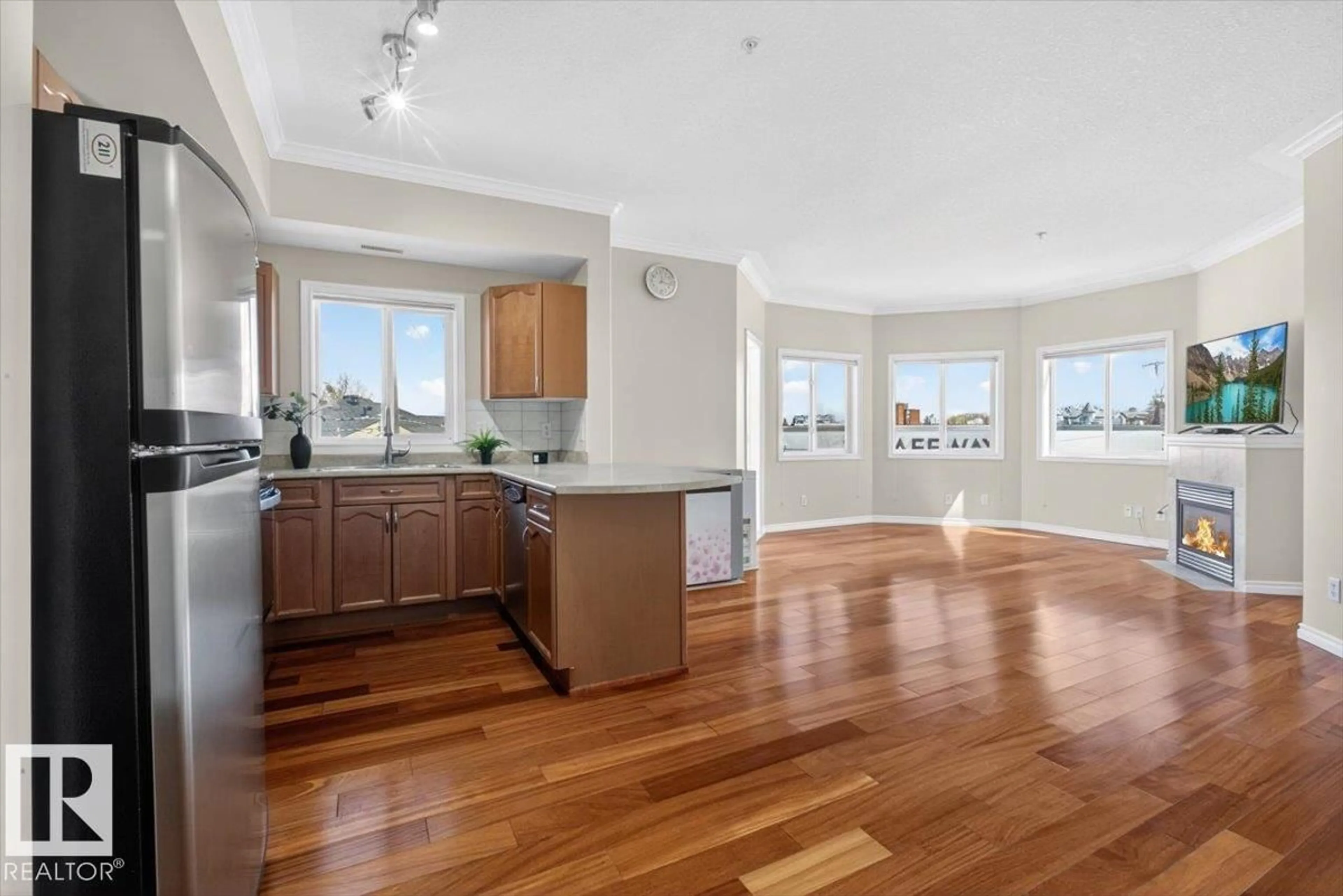 Open concept kitchen, wood/laminate floor for 326 - 8528 82 AV, Edmonton Alberta T6B0Y8