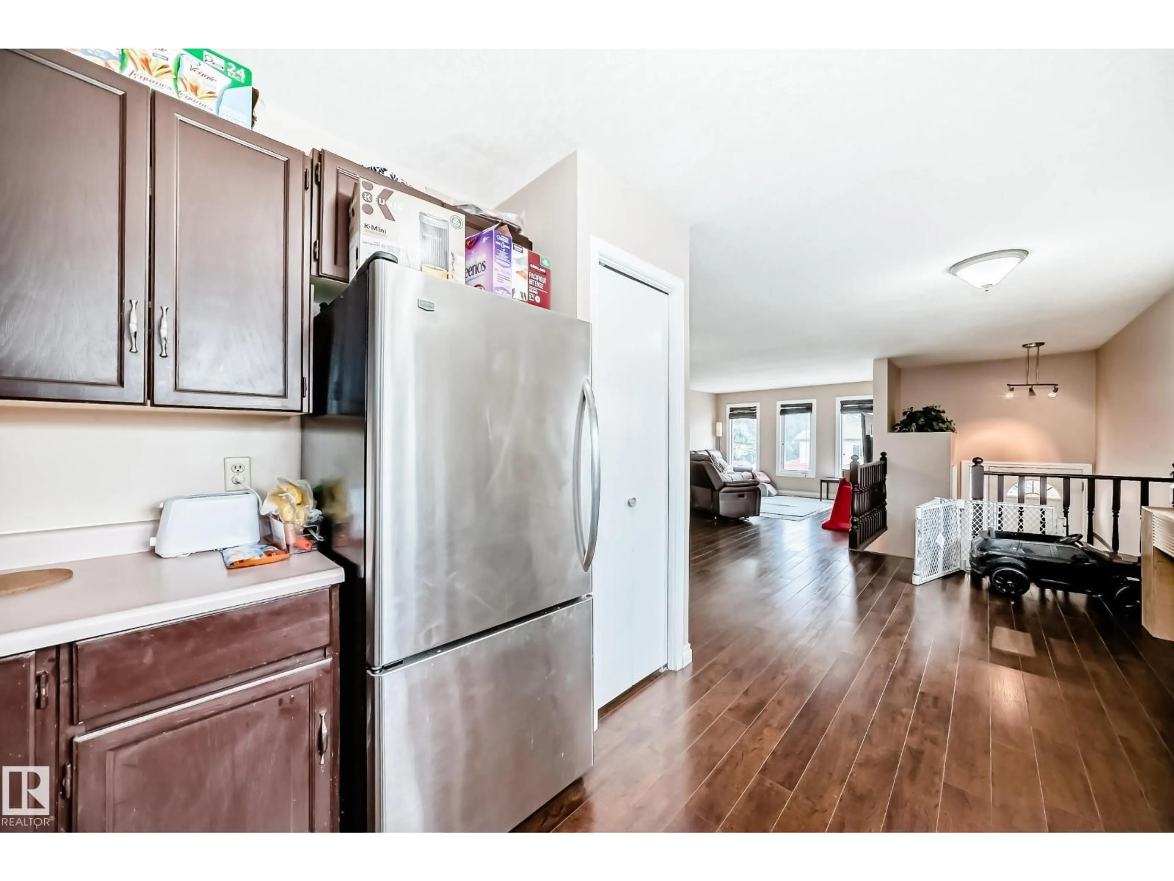 Open concept kitchen, wood/laminate floor for 9110 180A AV, Edmonton Alberta T5Z2K5