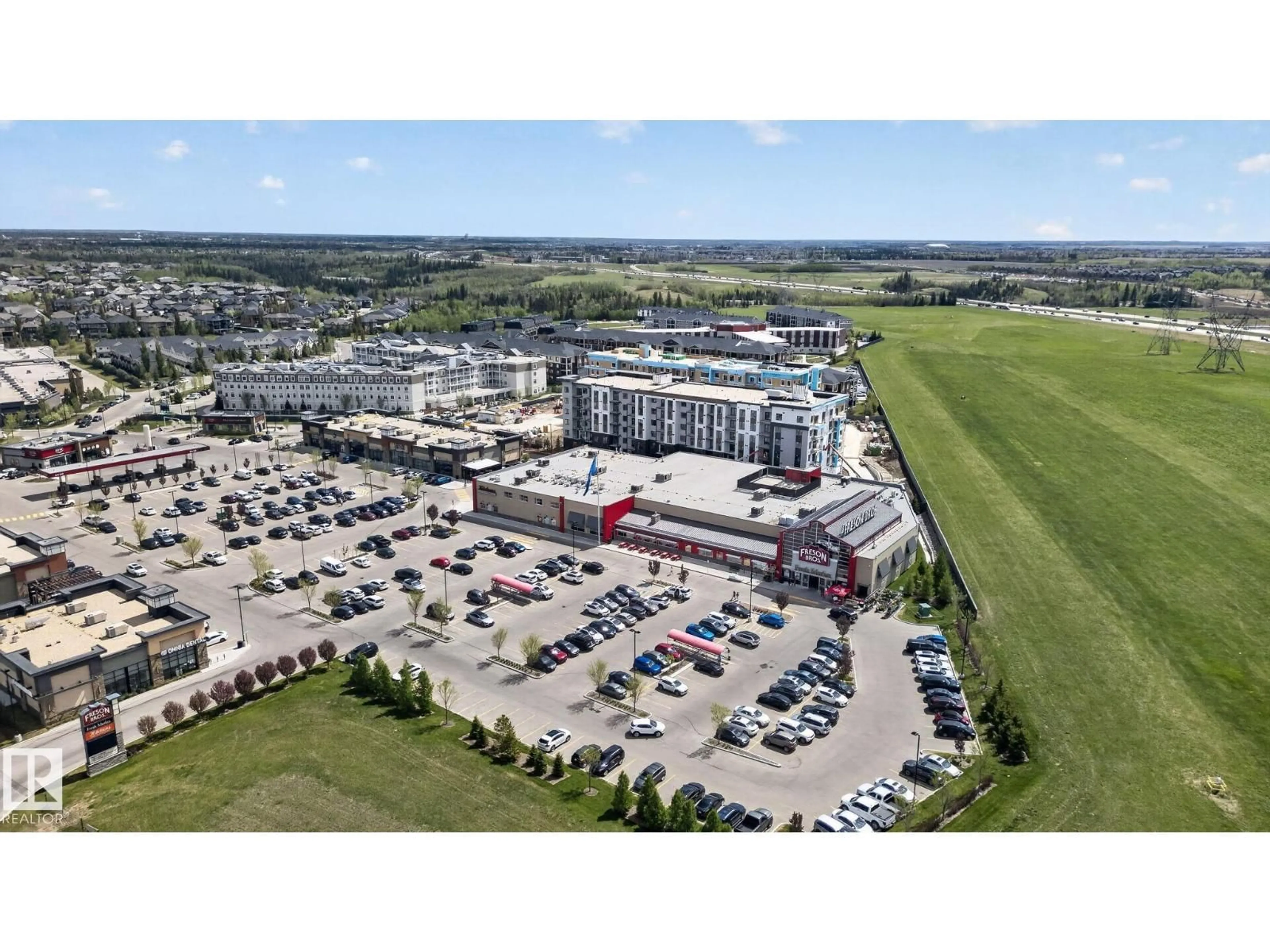 A pic from outside/outdoor area/front of a property/back of a property/a pic from drone, building for #318 - 5810 MULLEN PL, Edmonton Alberta T6R0W2