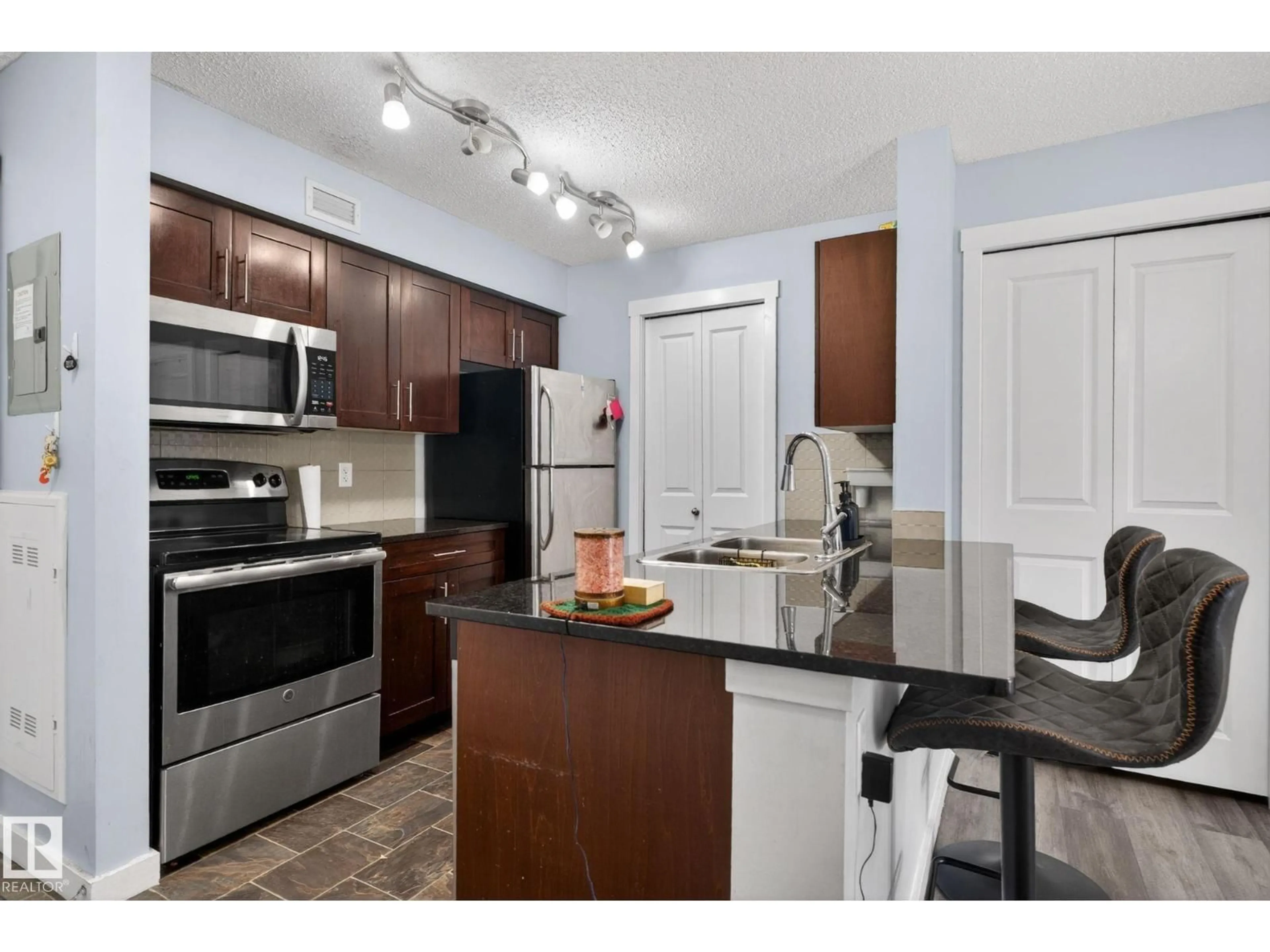 Standard kitchen, unknown for #318 - 5810 MULLEN PL, Edmonton Alberta T6R0W2