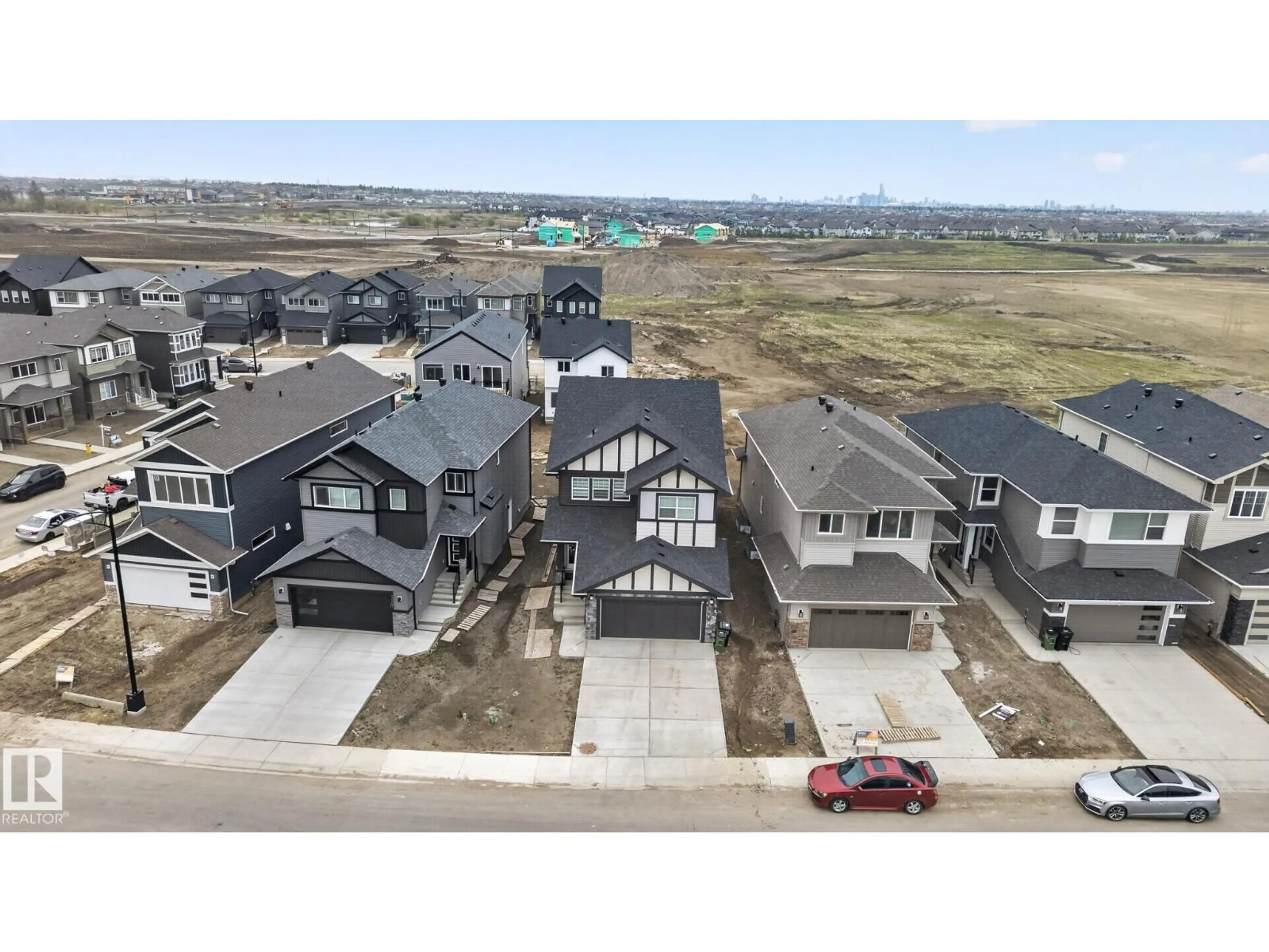 A pic from outside/outdoor area/front of a property/back of a property/a pic from drone, street for NW - 7011 177 AVENUE, Edmonton Alberta T5Z0W8