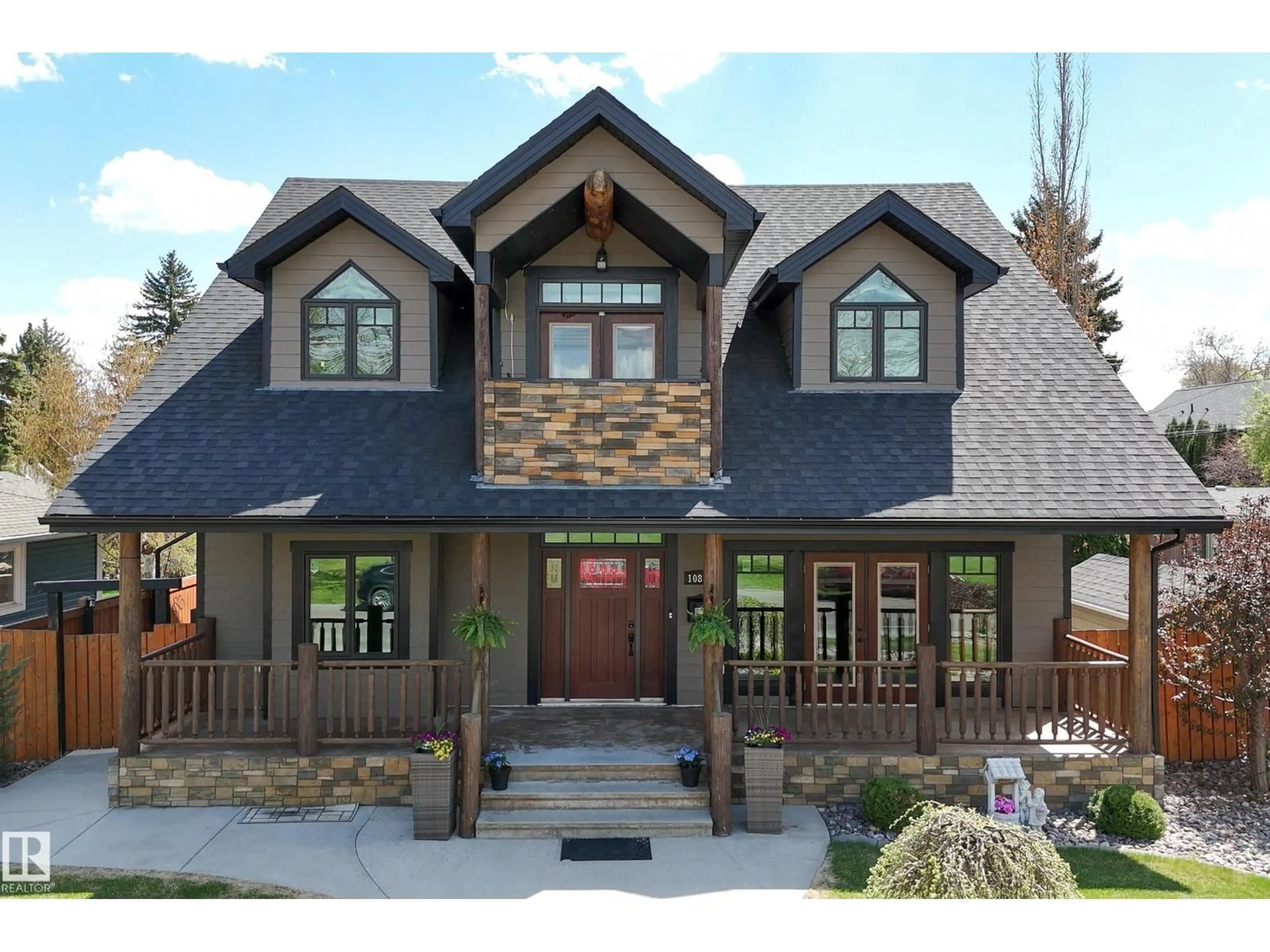 Home with brick exterior material, mountain view for 10811 67 ST, Edmonton Alberta T6A2S3