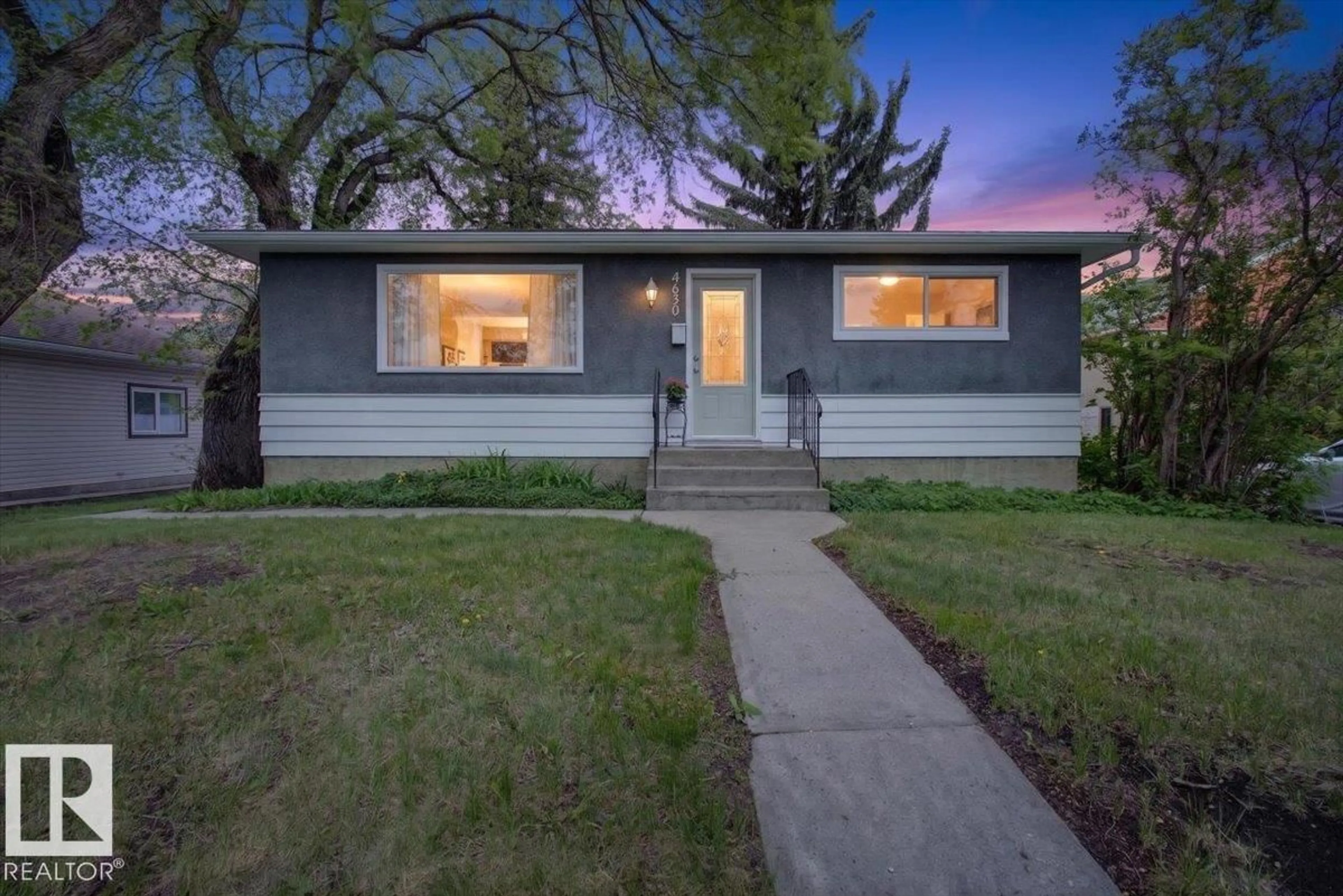 Home with vinyl exterior material, street for 4630 114 AV, Edmonton Alberta T5W0T5