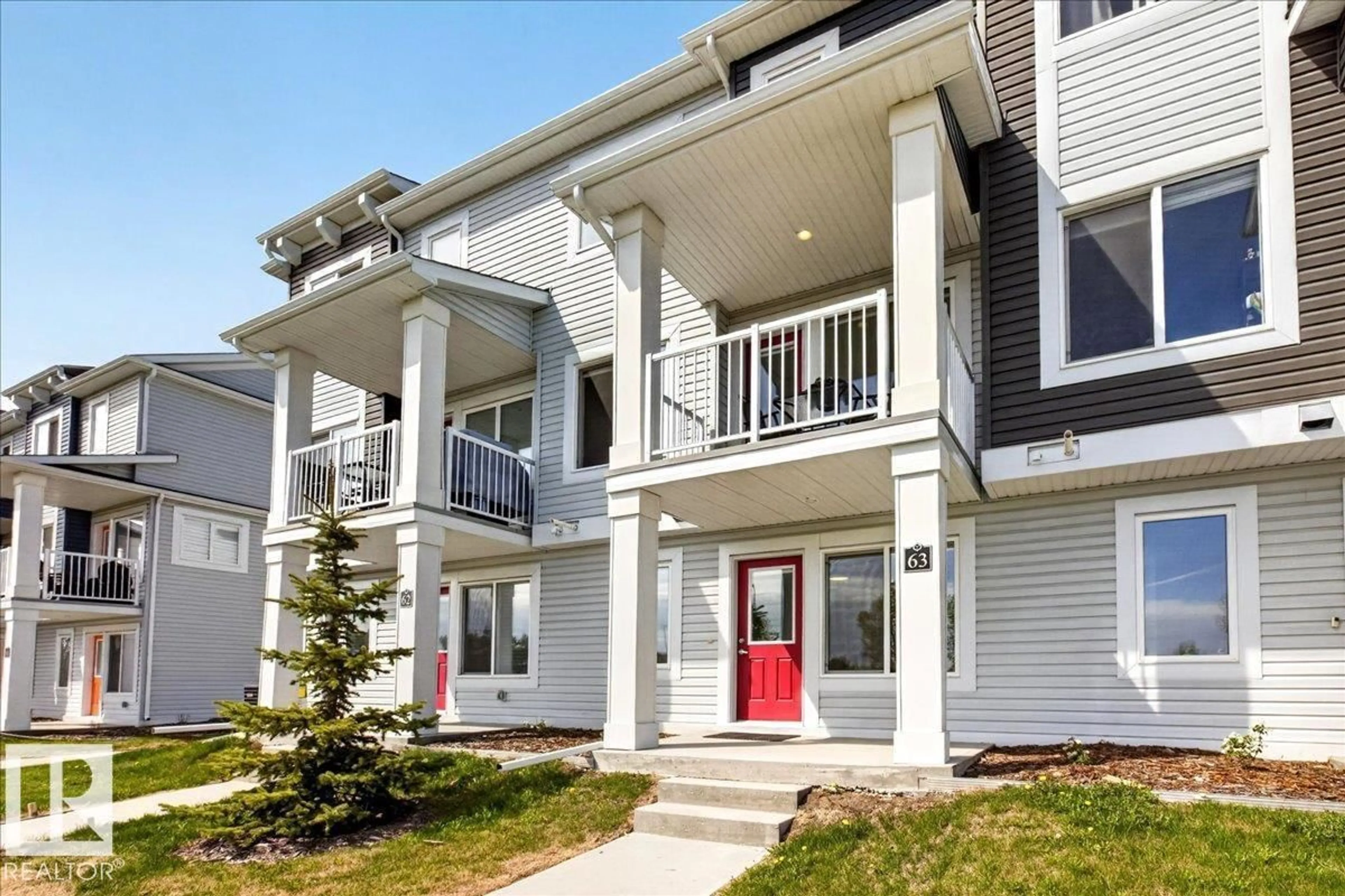 Home with vinyl exterior material, street for #63 - 16335 84 ST NW, Edmonton Alberta T5Z0S2