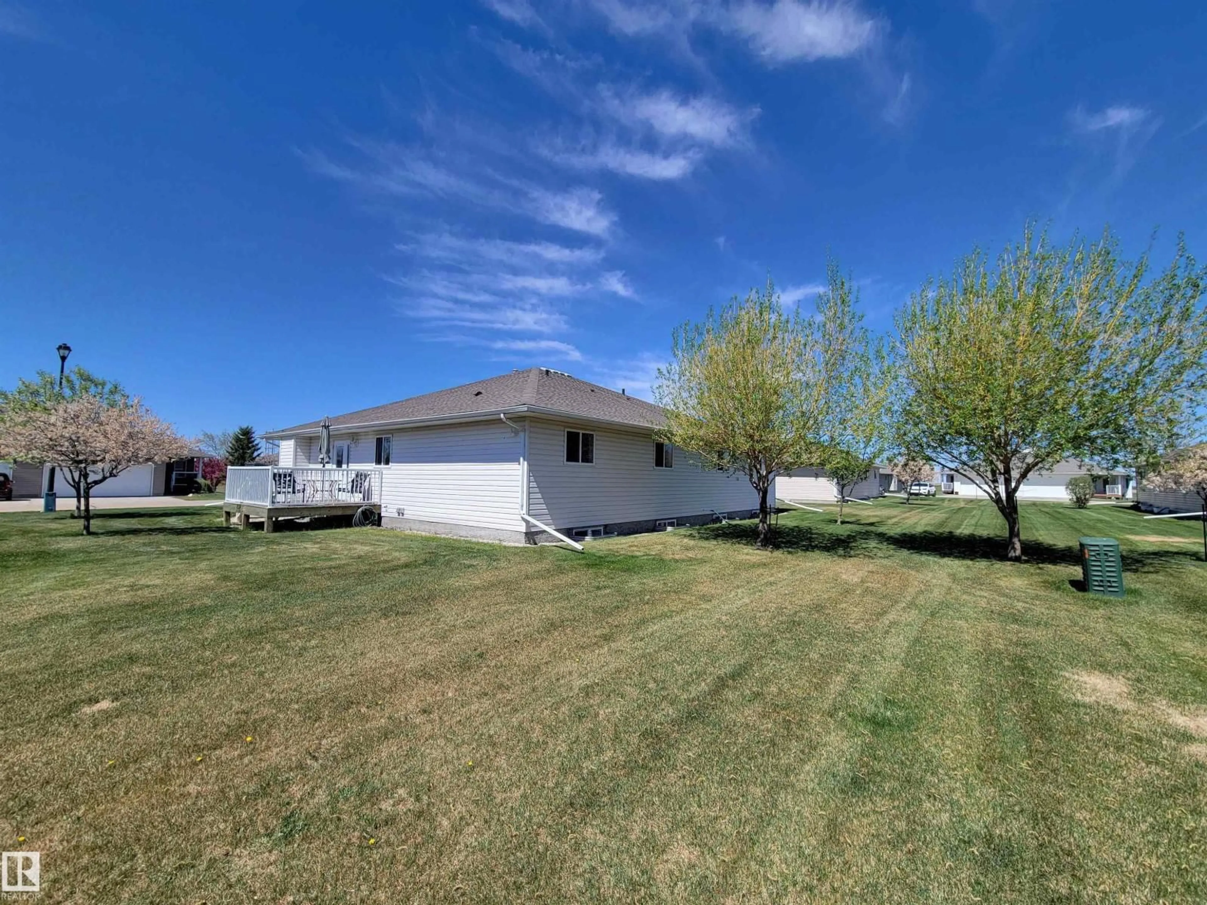 A pic from outside/outdoor area/front of a property/back of a property/a pic from drone, water/lake/river/ocean view for #410 - 7001 NORTHVIEW DR, Wetaskiwin Alberta T9A0H1