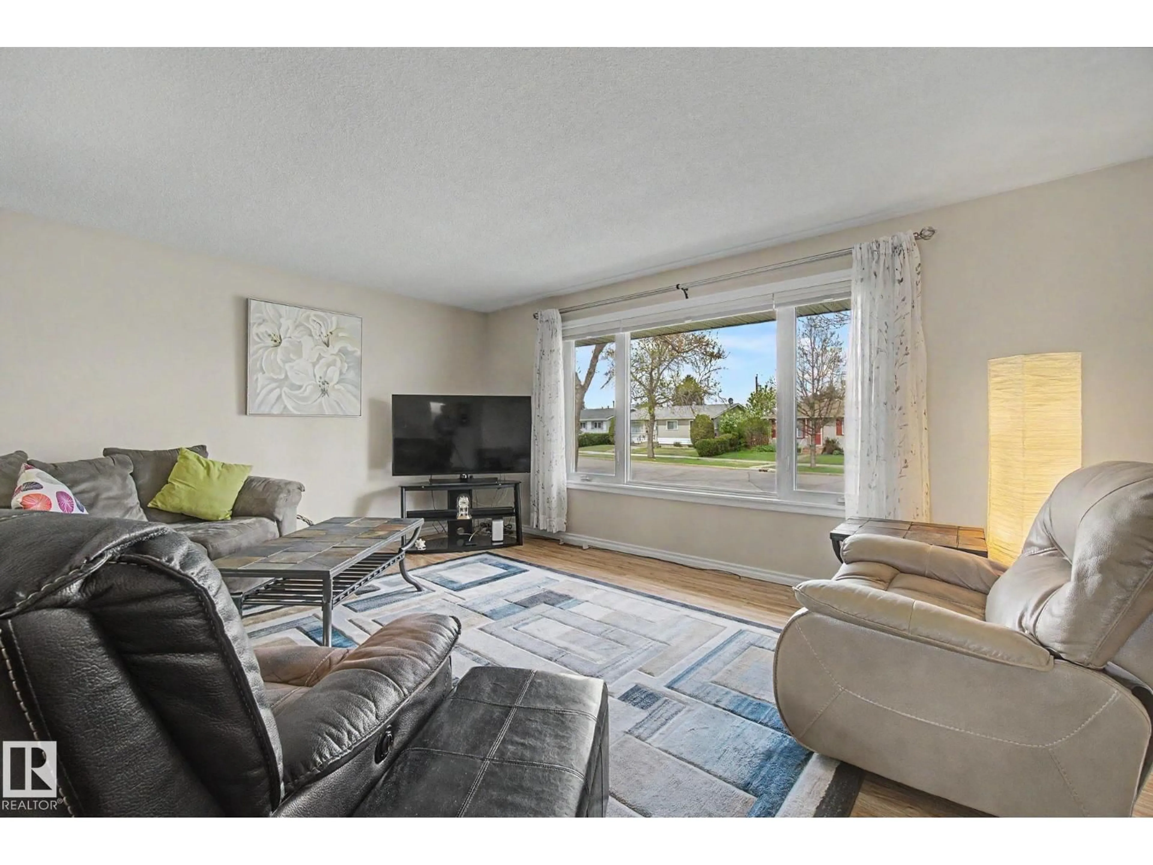 Living room with furniture, unknown for 16727 80 AV, Edmonton Alberta T5R3N1