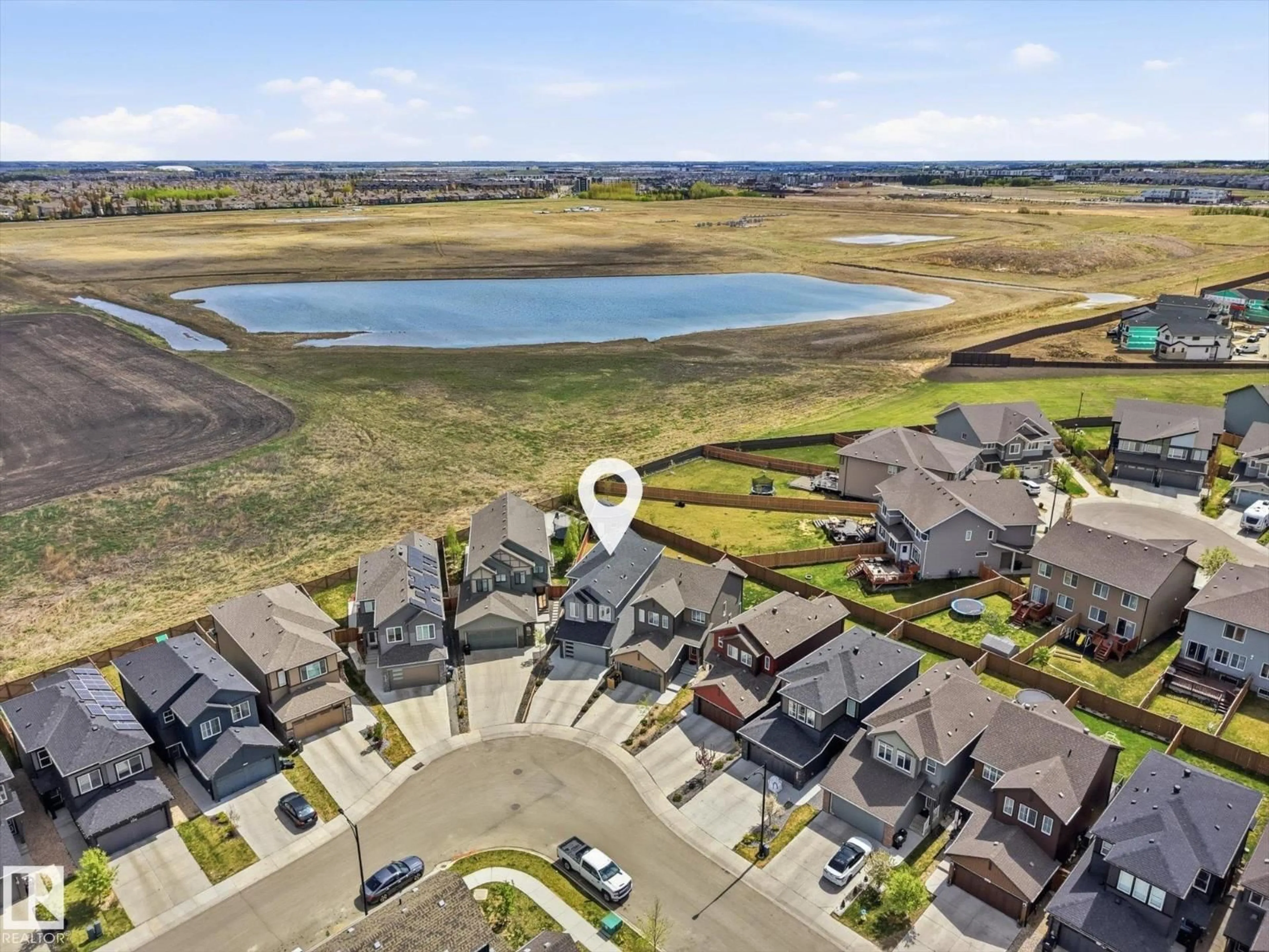 A pic from outside/outdoor area/front of a property/back of a property/a pic from drone, water/lake/river/ocean view for 2128 GRAYDON HILL CR, Edmonton Alberta T6W4K6