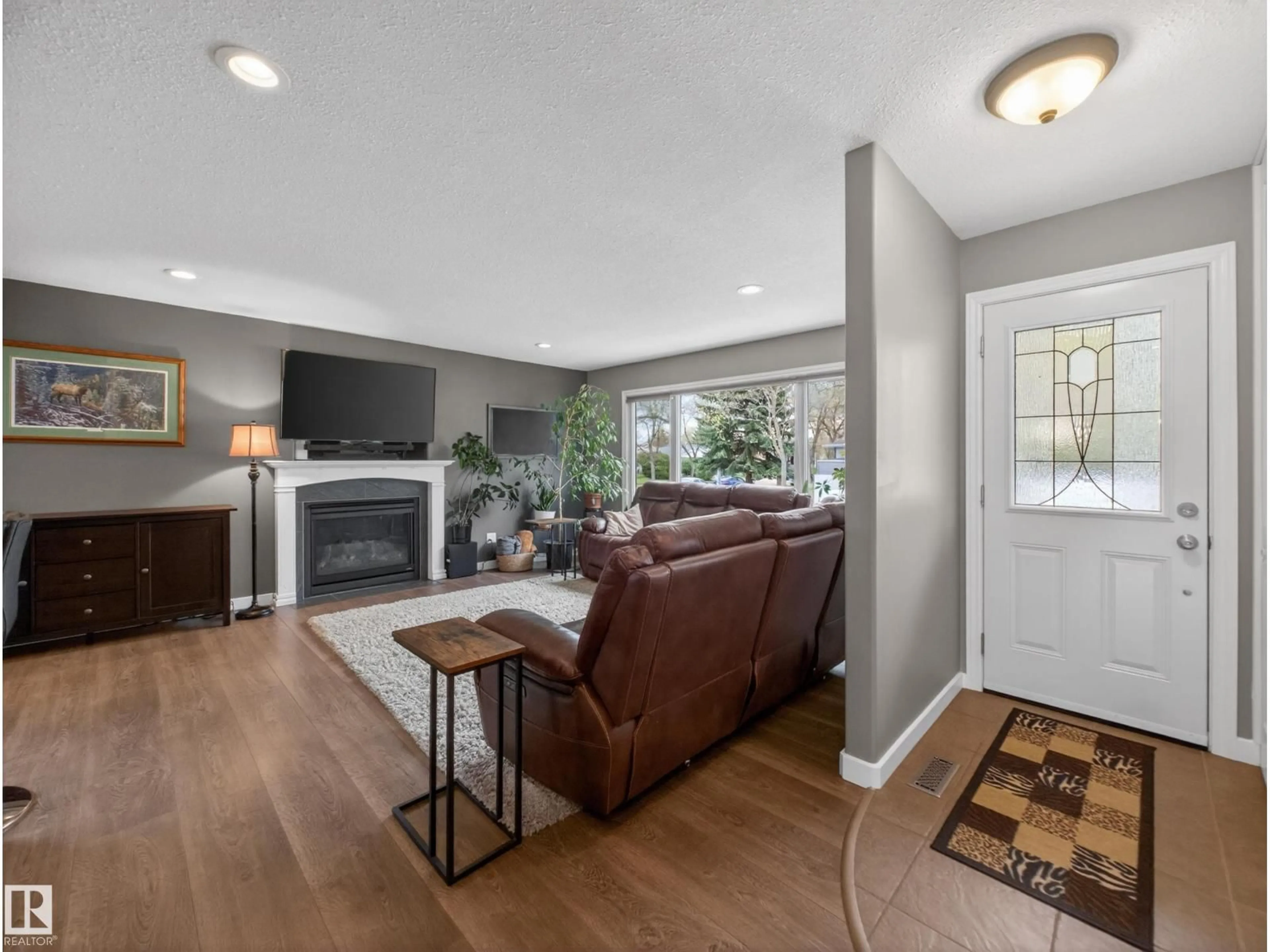 Living room with furniture, unknown for 8410 95B AVE, Fort Saskatchewan Alberta T8L2V6