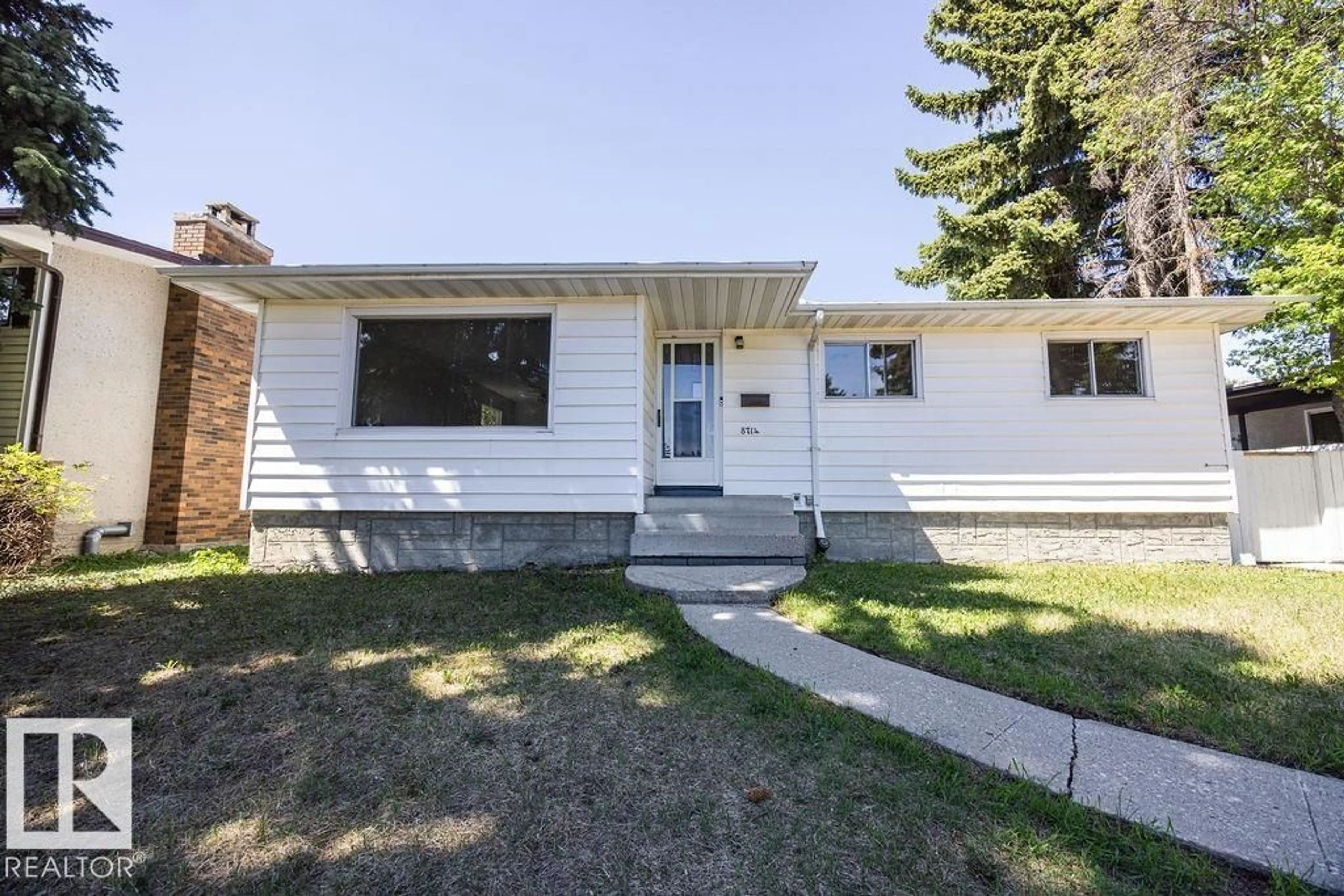 Home with vinyl exterior material, street for 8714 164 ST, Edmonton Alberta T5R2R1