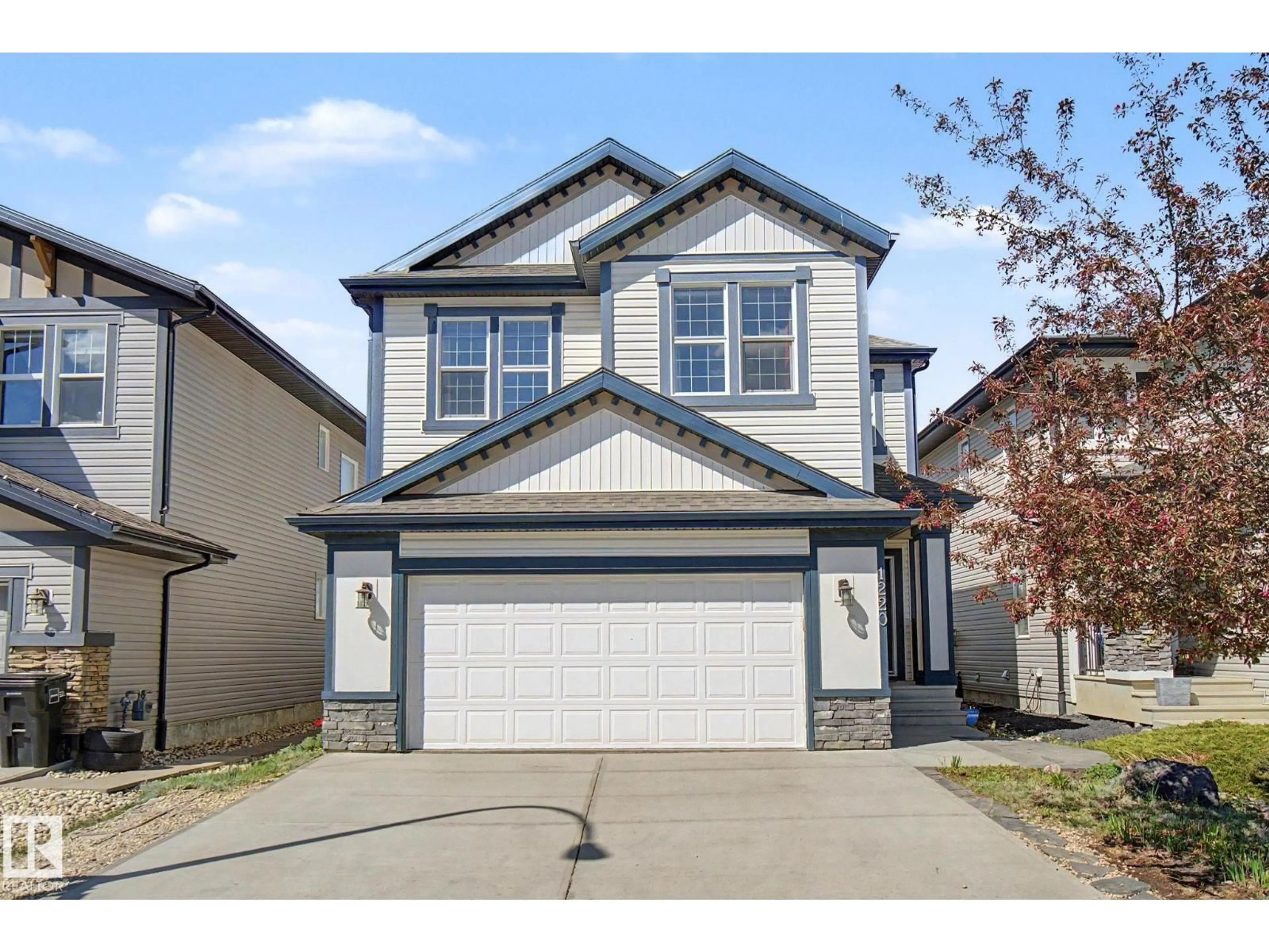 Home with vinyl exterior material, street for 1220 SECORD LANDING LD, Edmonton Alberta T5T4N3