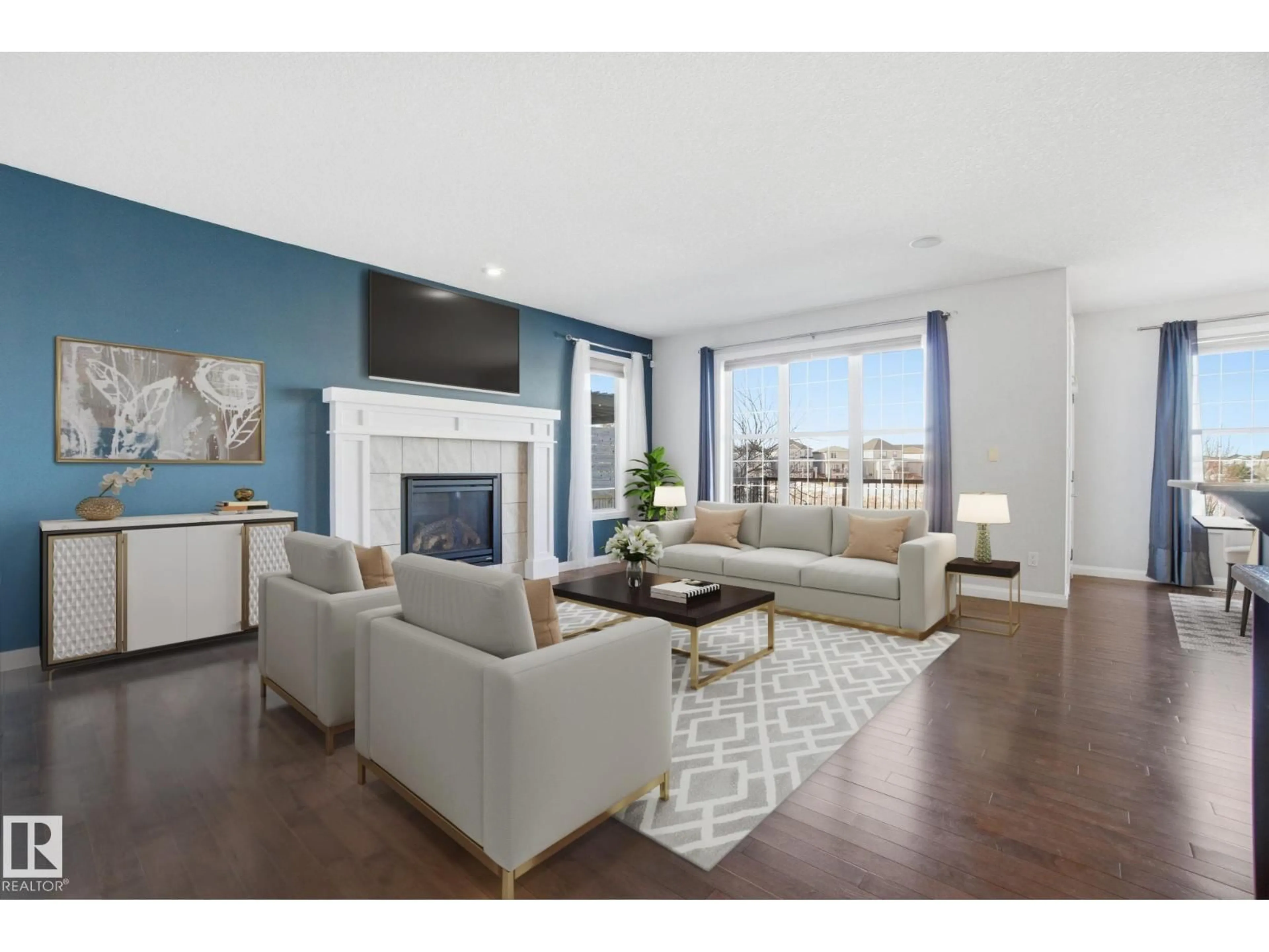 Living room with furniture, wood/laminate floor for 1220 SECORD LANDING LD, Edmonton Alberta T5T4N3