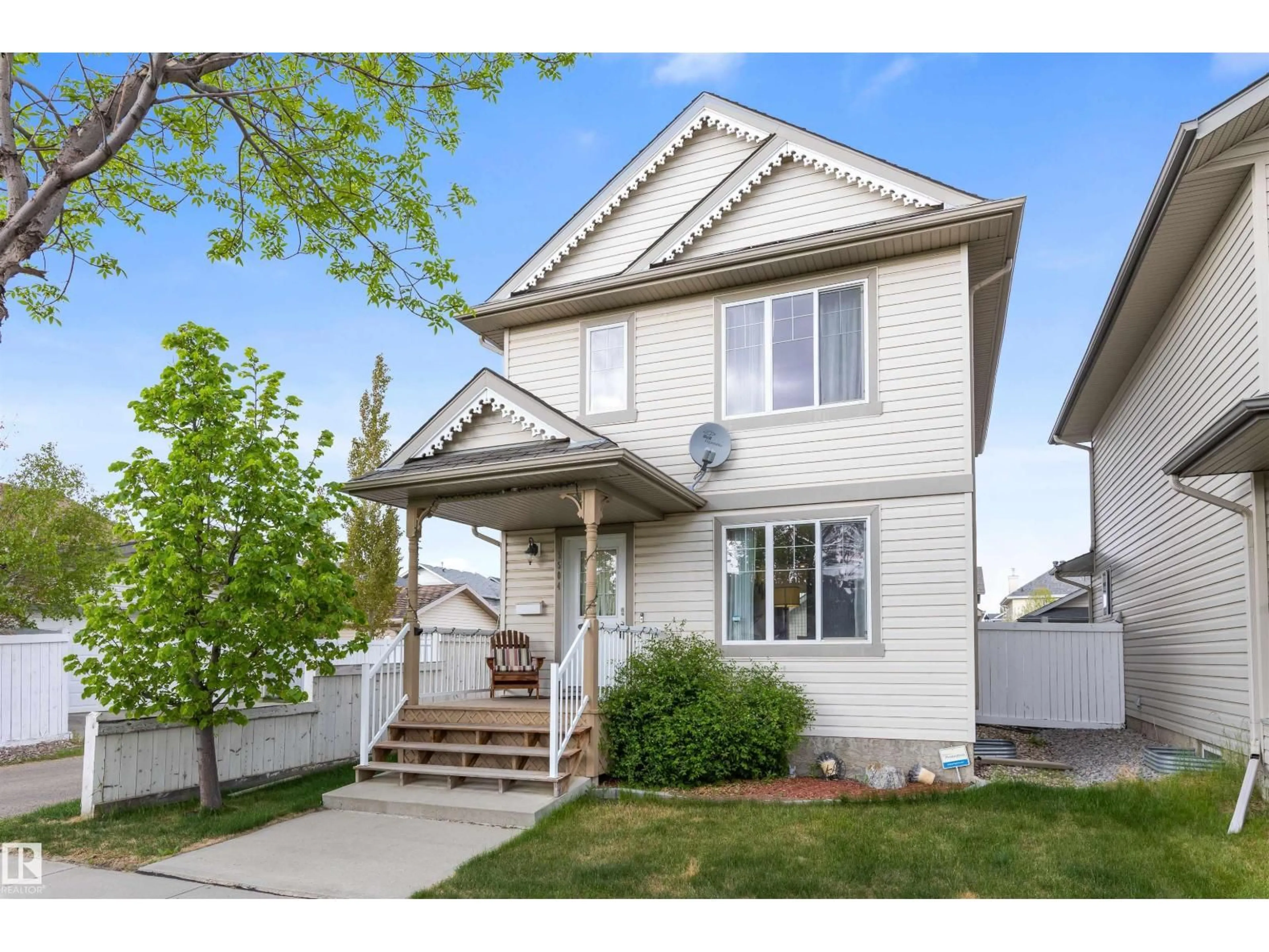 Home with vinyl exterior material, street for 5504 STEVENS CR, Edmonton Alberta T6R3R4