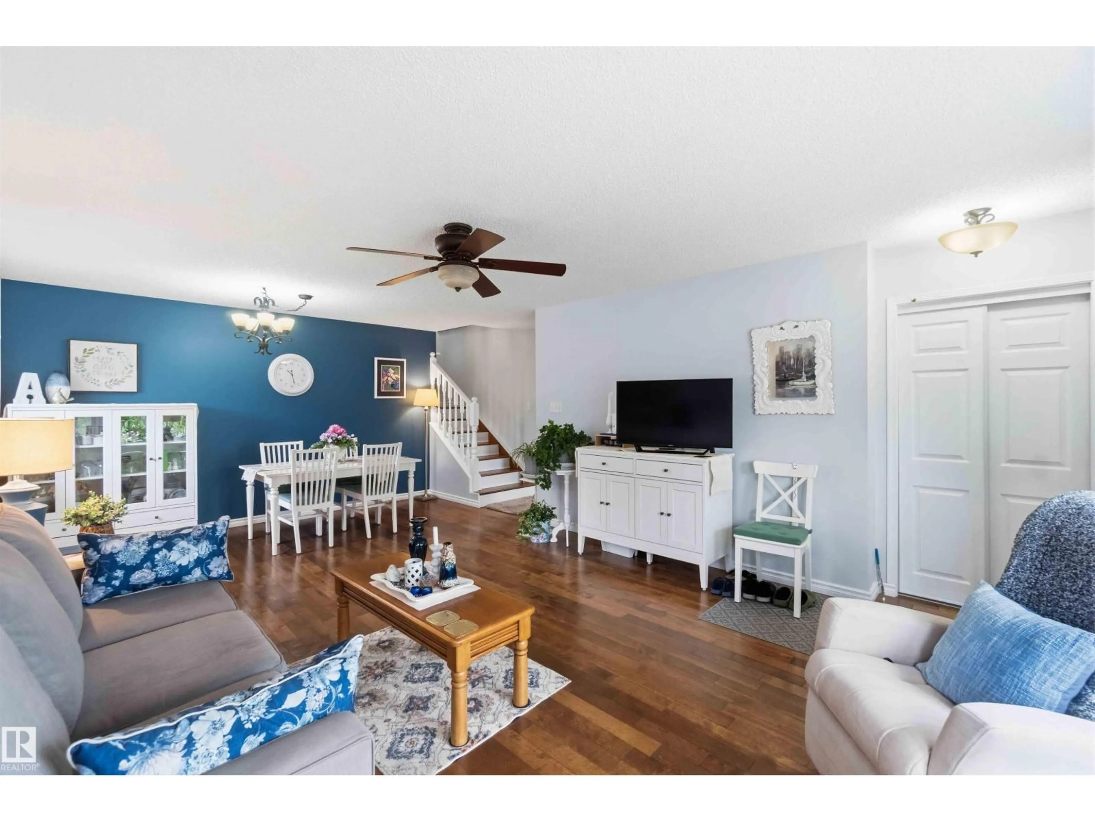 Living room with furniture, wood/laminate floor for 96 MCKEAN WY, Spruce Grove Alberta T7X2S7