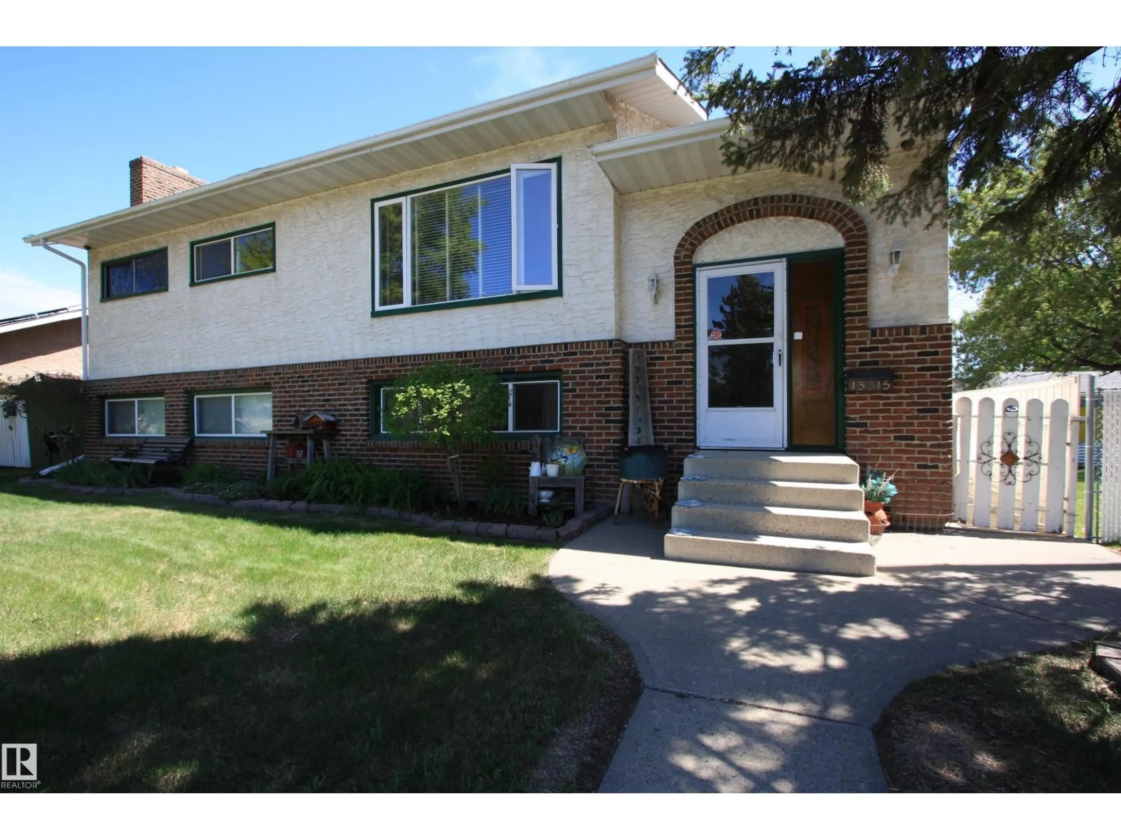Home with brick exterior material, street for NW - 13315 136 ST, Edmonton Alberta T5L1Z8
