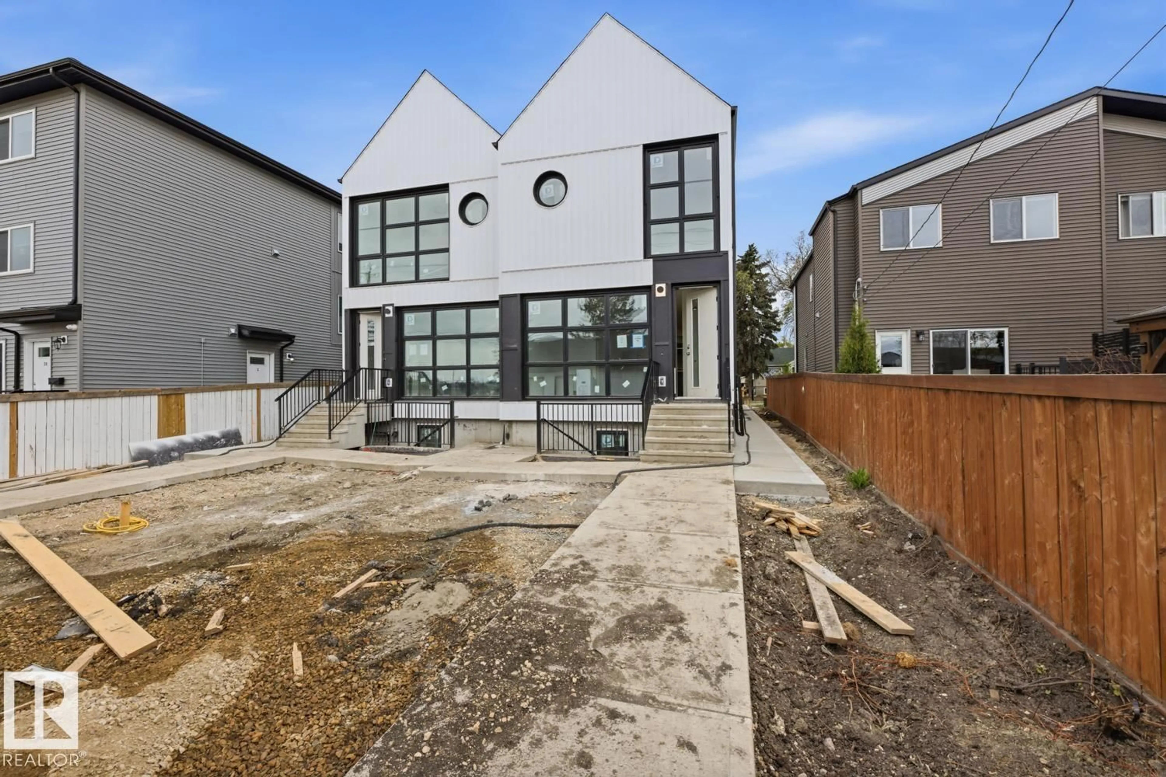 Home with brick exterior material, street for NW - 11327 122 ST, Edmonton Alberta T5M0B6