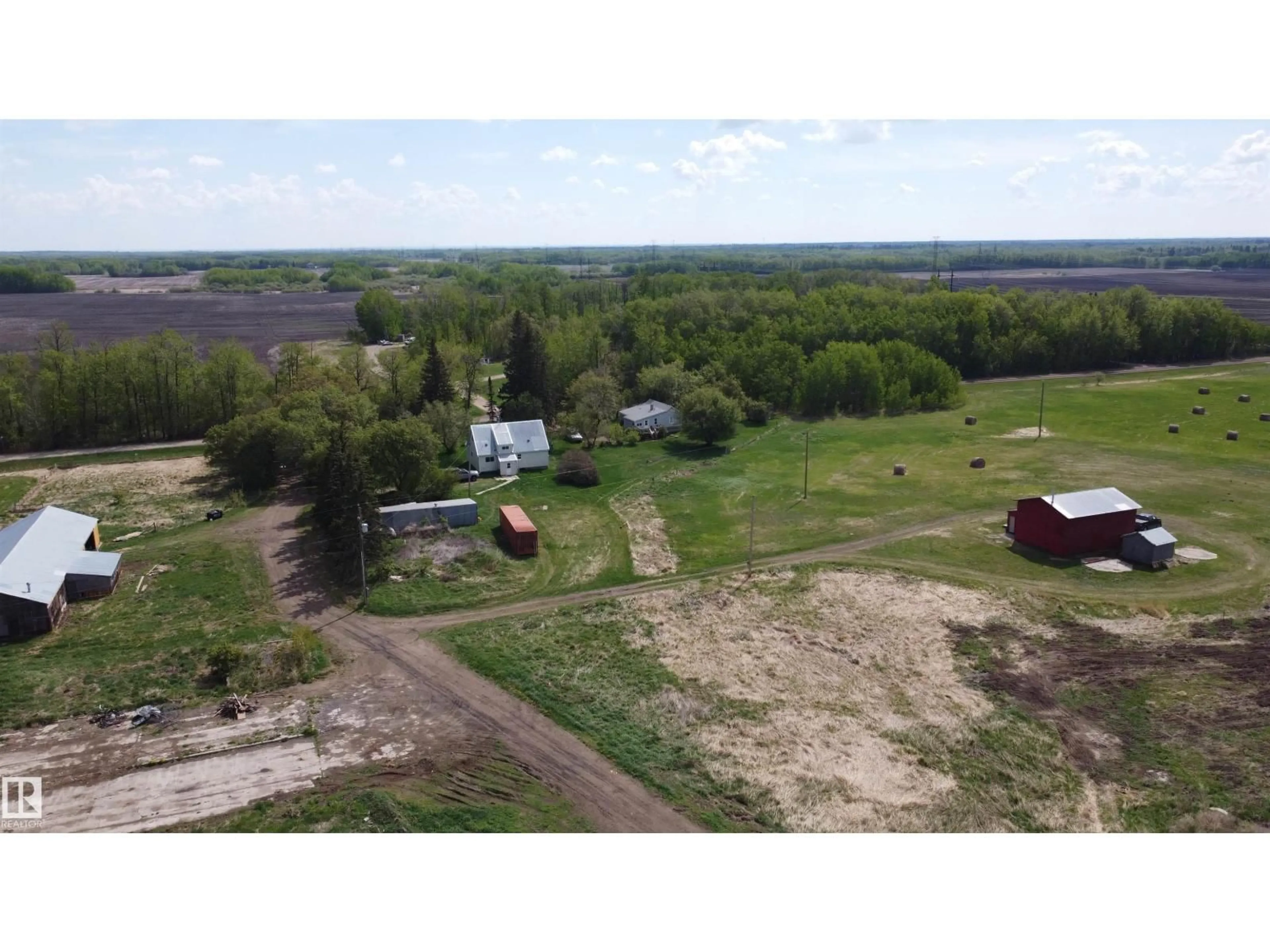 A pic from outside/outdoor area/front of a property/back of a property/a pic from drone, unknown for 52024A RGE ROAD 265, Rural Parkland County Alberta T7X3L7