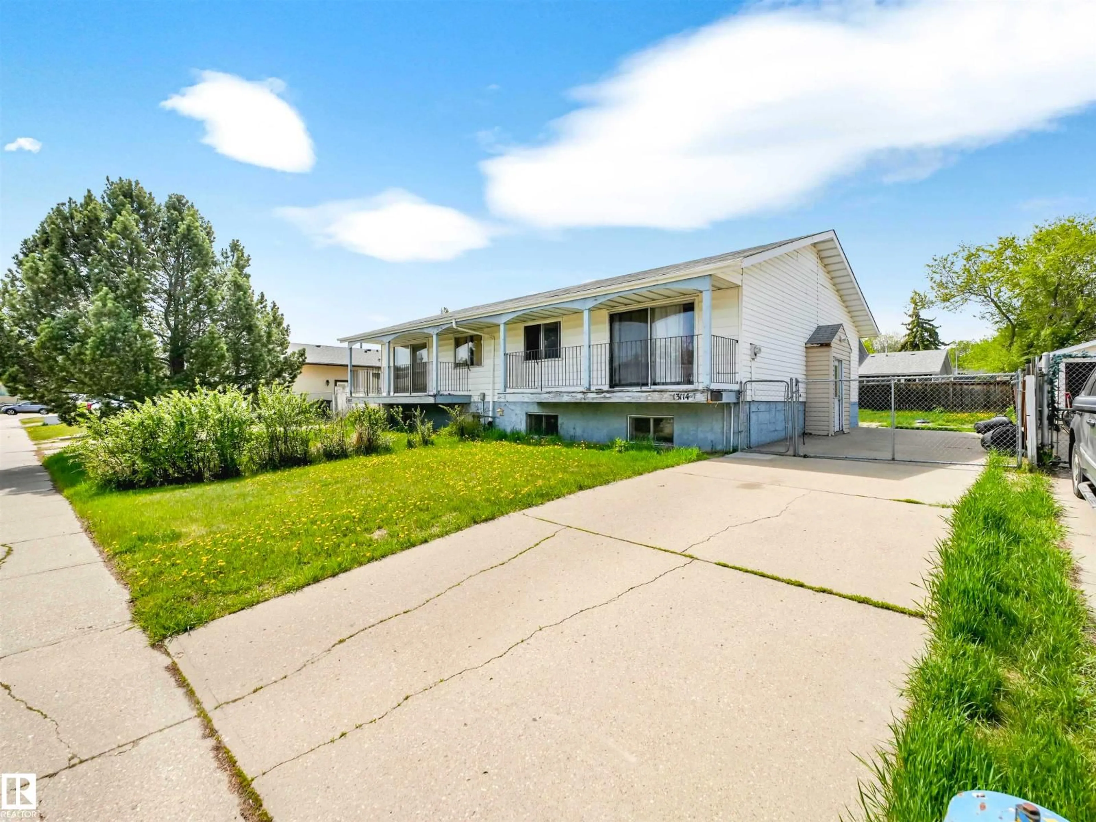 Home with vinyl exterior material, street for NW - 13114 30 ST, Edmonton Alberta T5A3A2