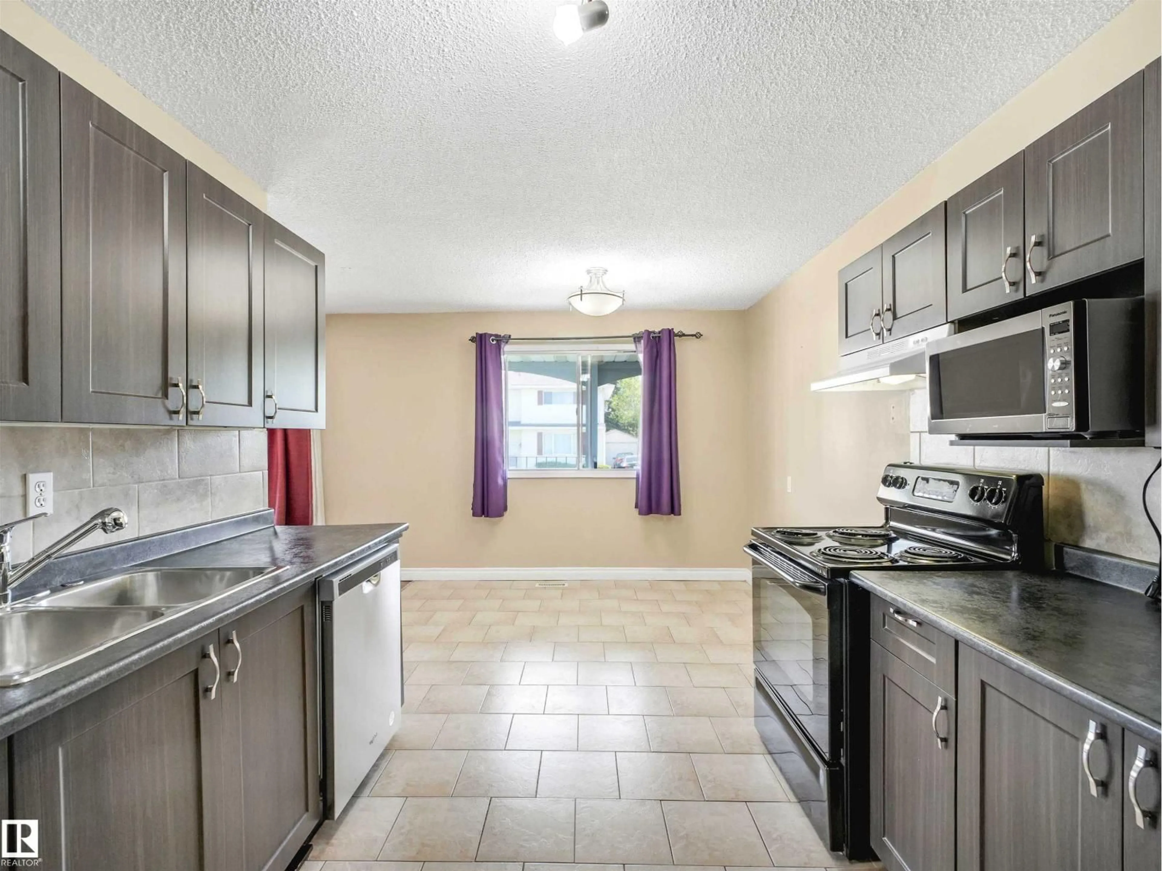 Standard kitchen, ceramic/tile floor for NW - 13114 30 ST, Edmonton Alberta T5A3A2