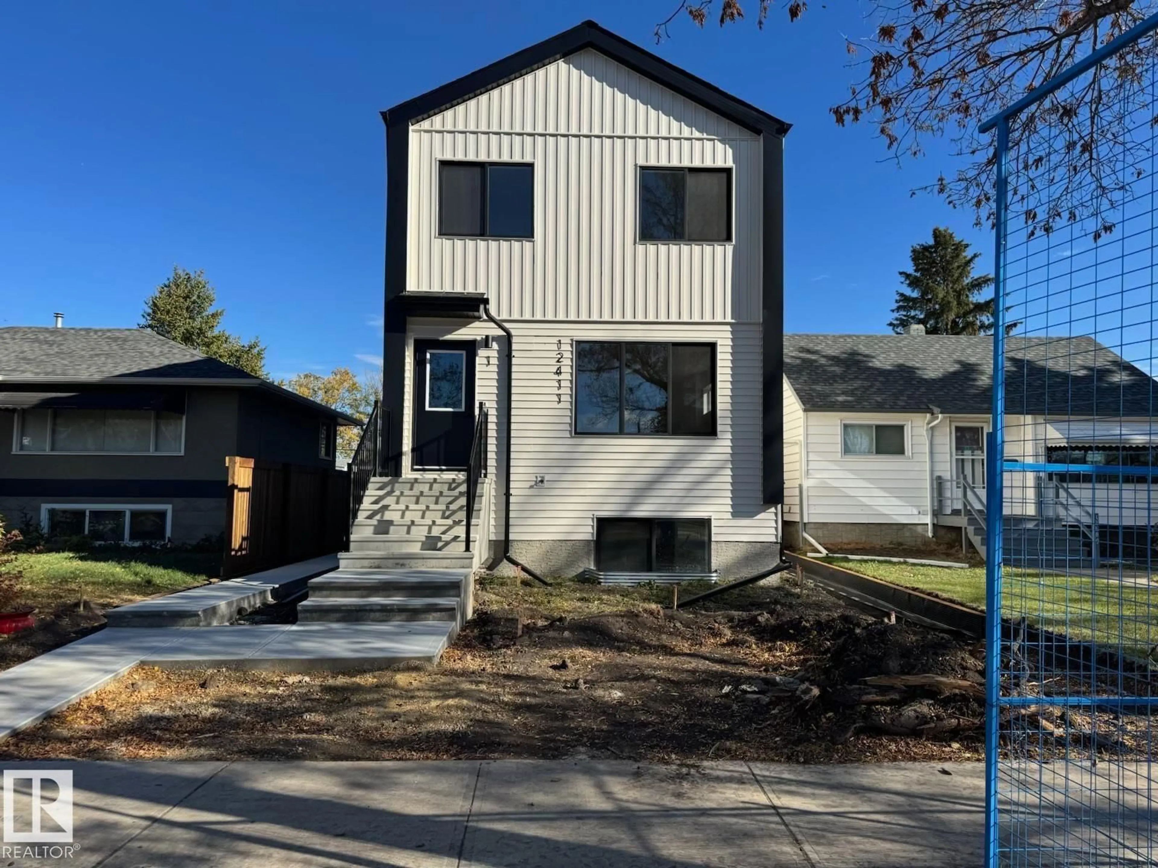 Home with vinyl exterior material, street for 1, 2, 3 - 12411 81 ST NW, Edmonton Alberta T5B2T6