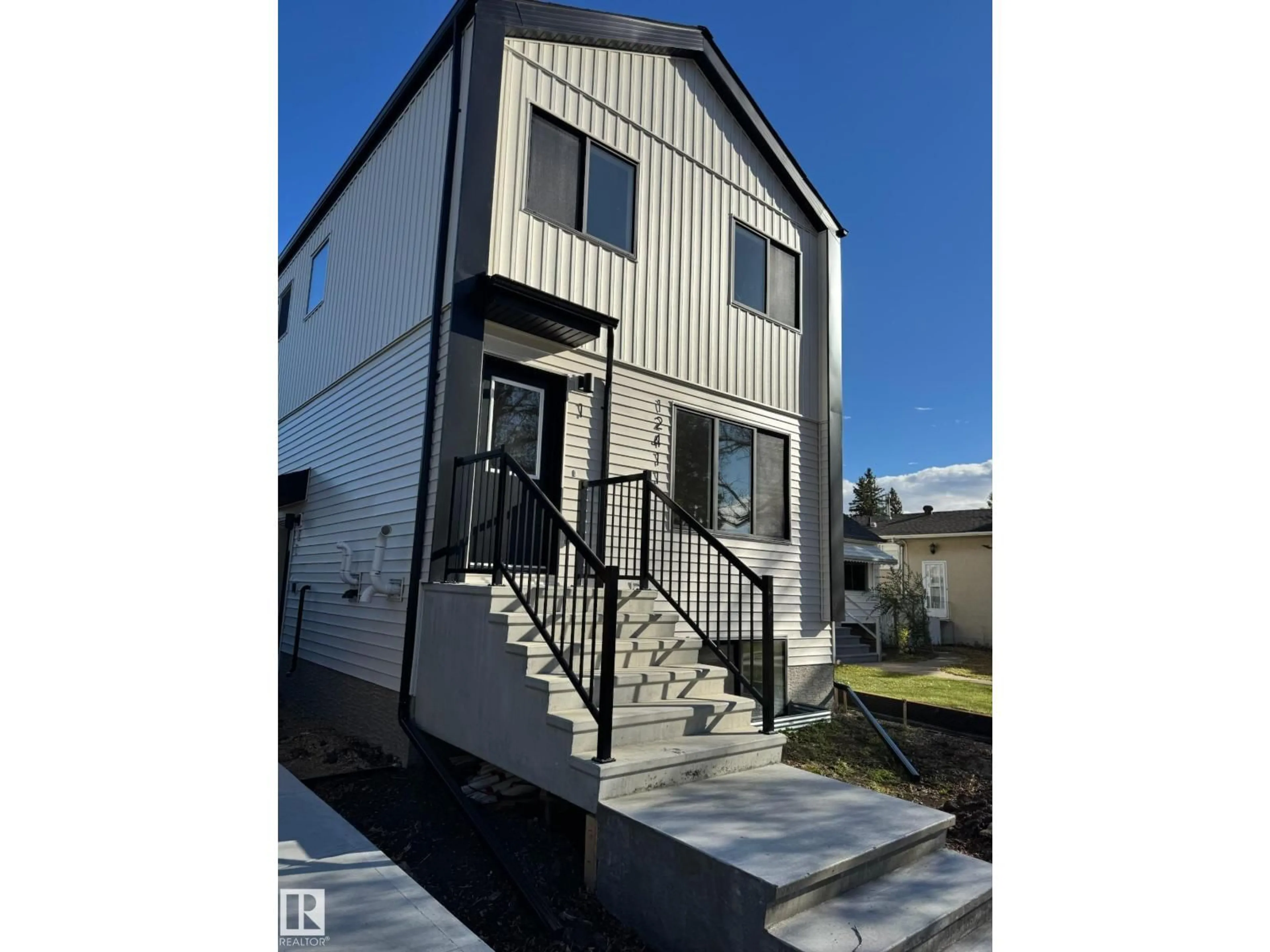 Home with vinyl exterior material, street for 1, 2, 3 - 12411 81 ST NW, Edmonton Alberta T5B2T6