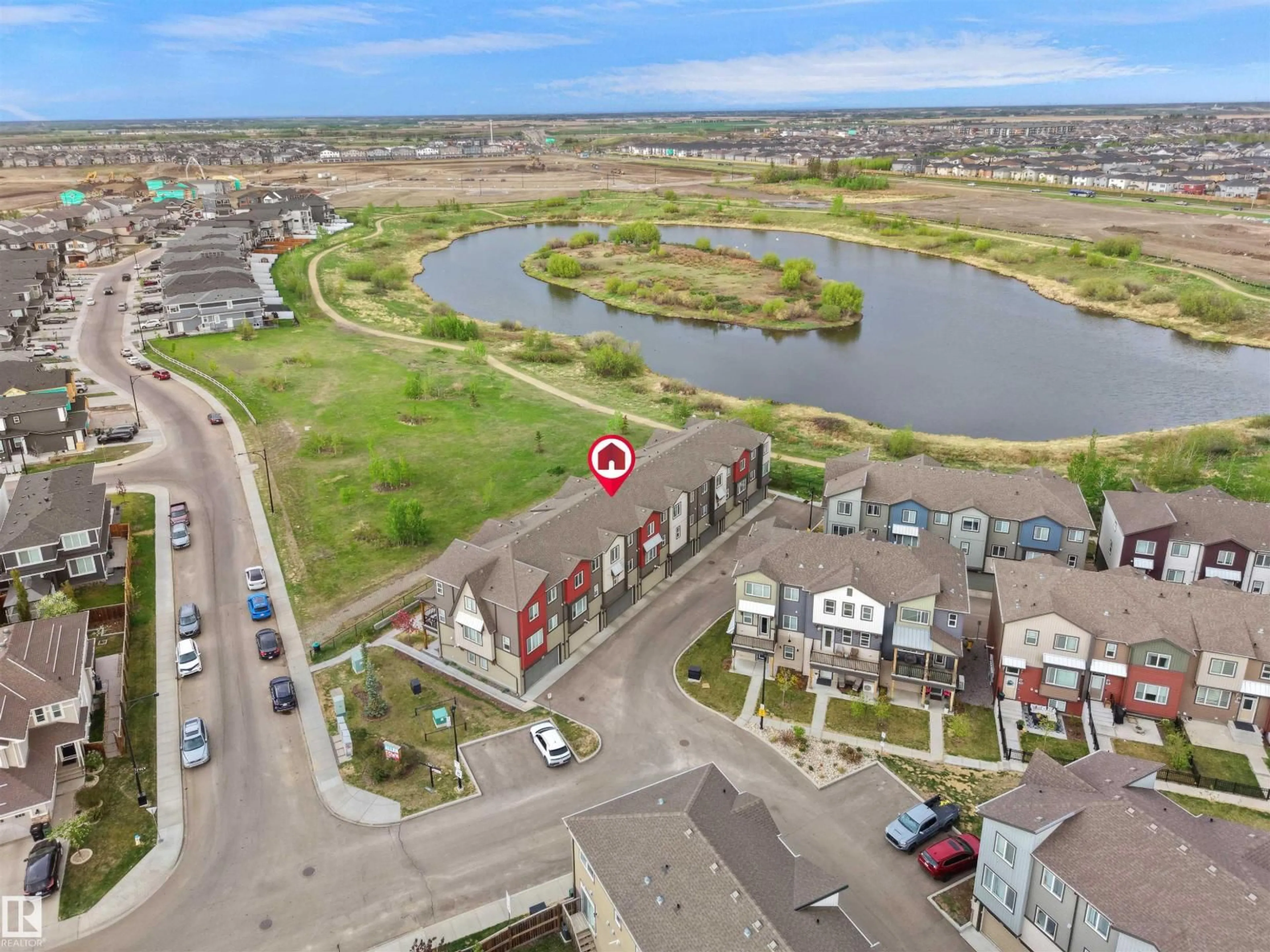A pic from outside/outdoor area/front of a property/back of a property/a pic from drone, water/lake/river/ocean view for #140 - 16903 68 ST, Edmonton Alberta T5Z0R1