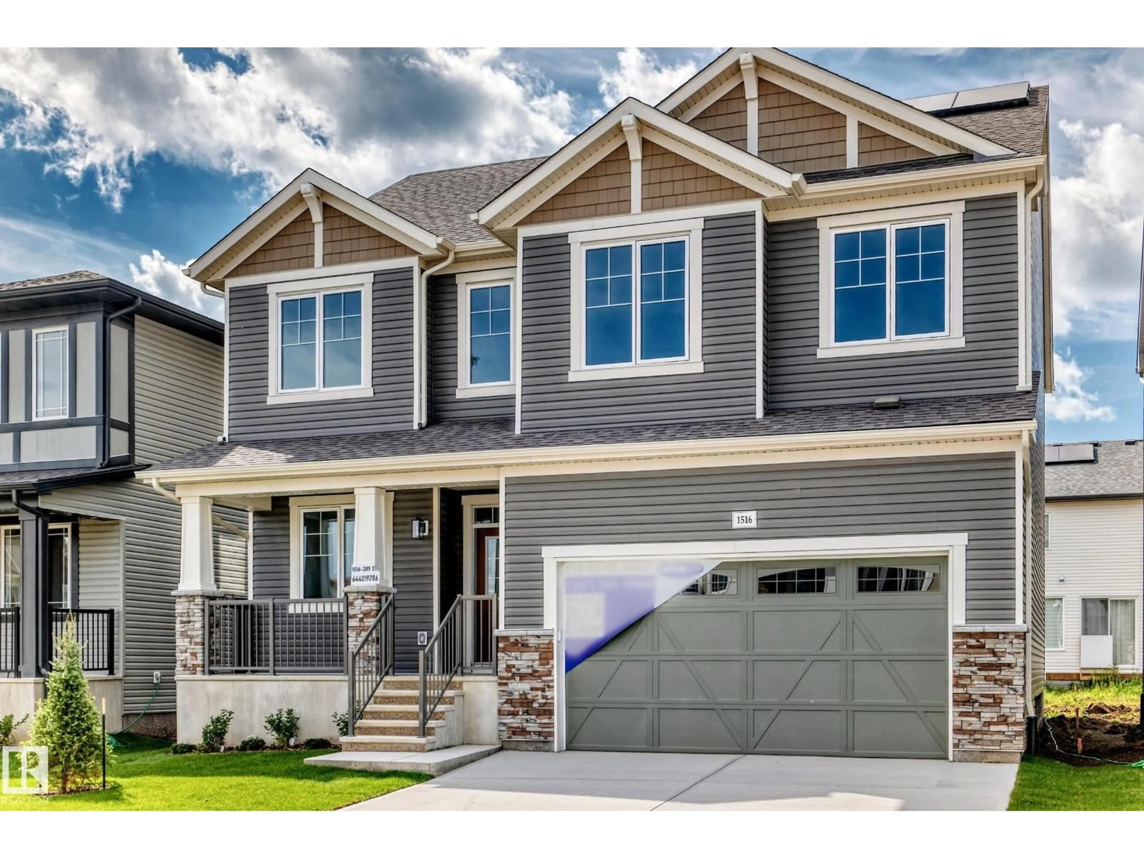Home with vinyl exterior material, street for NW - 1516 205 ST, Edmonton Alberta T6M3E7