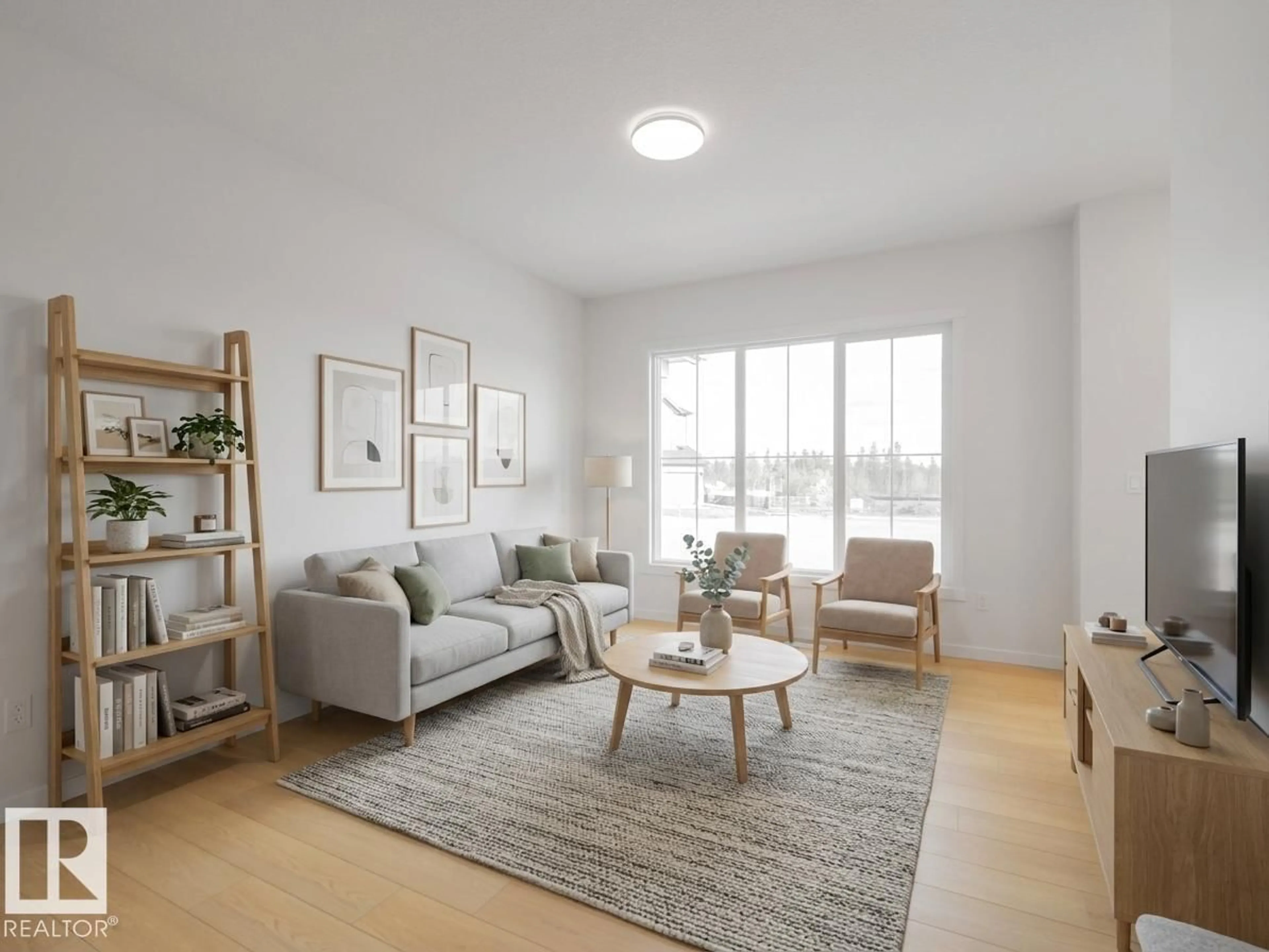 Living room with furniture, wood/laminate floor for 328 172 AV, Edmonton Alberta T5Y4G8
