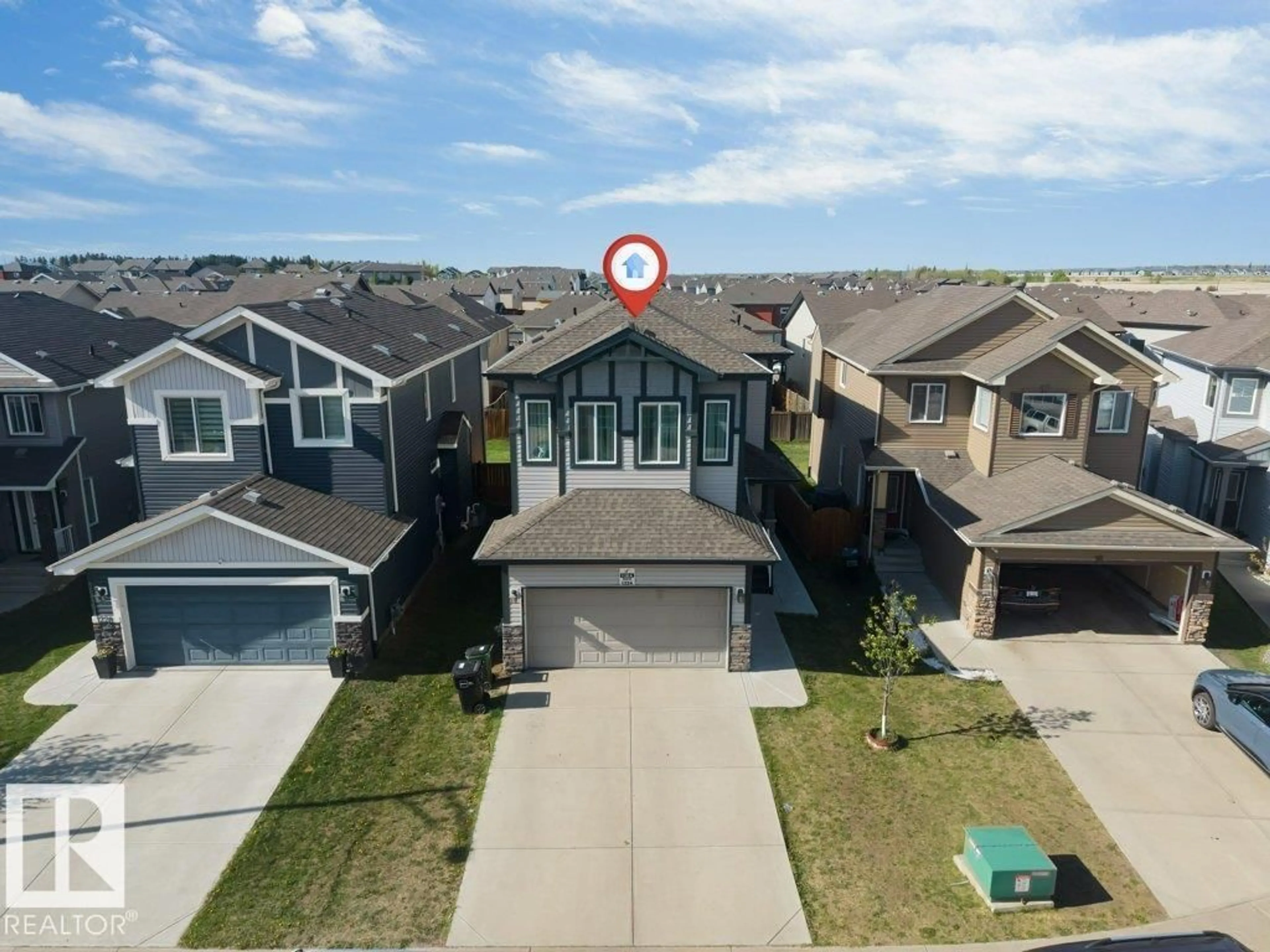 A pic from outside/outdoor area/front of a property/back of a property/a pic from drone, street for 1224 25 AV, Edmonton Alberta T6T2E5