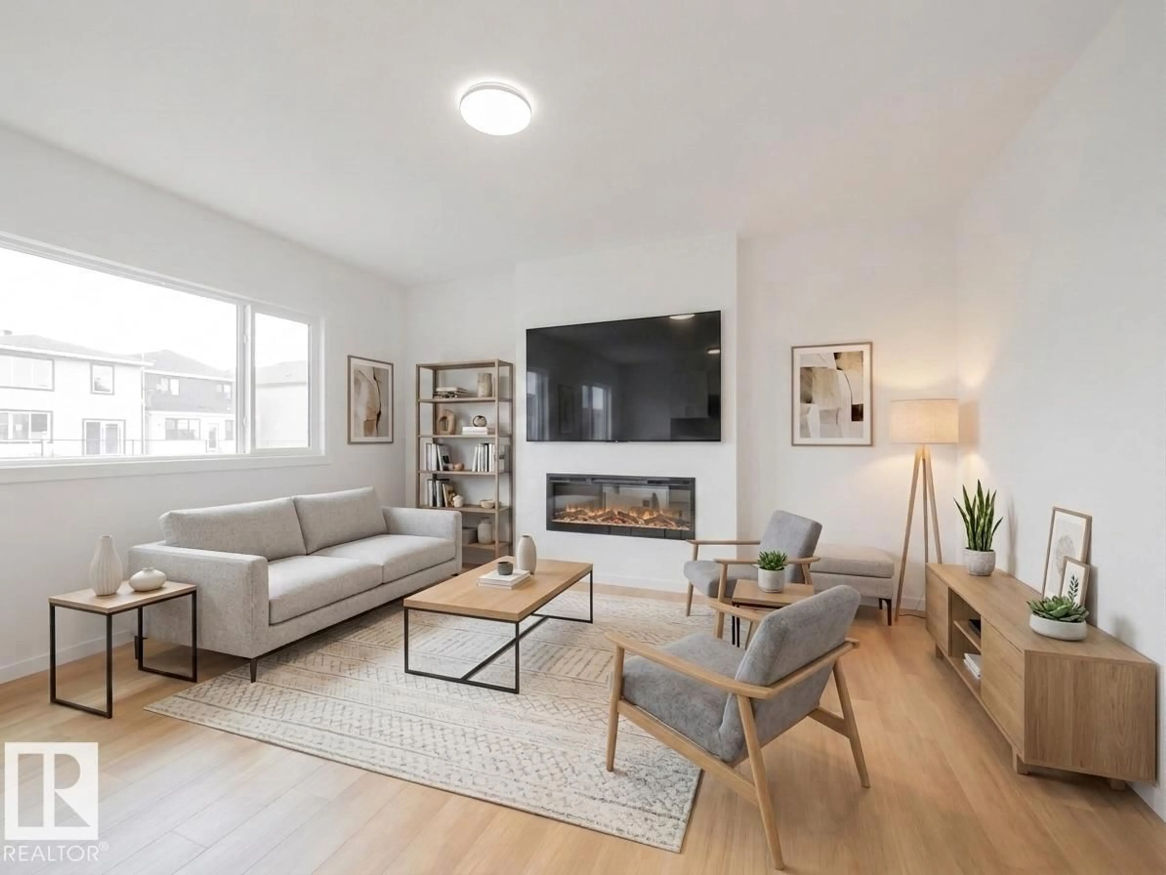 Living room with furniture, wood/laminate floor for 947 18 AV, Edmonton Alberta T6T2X3