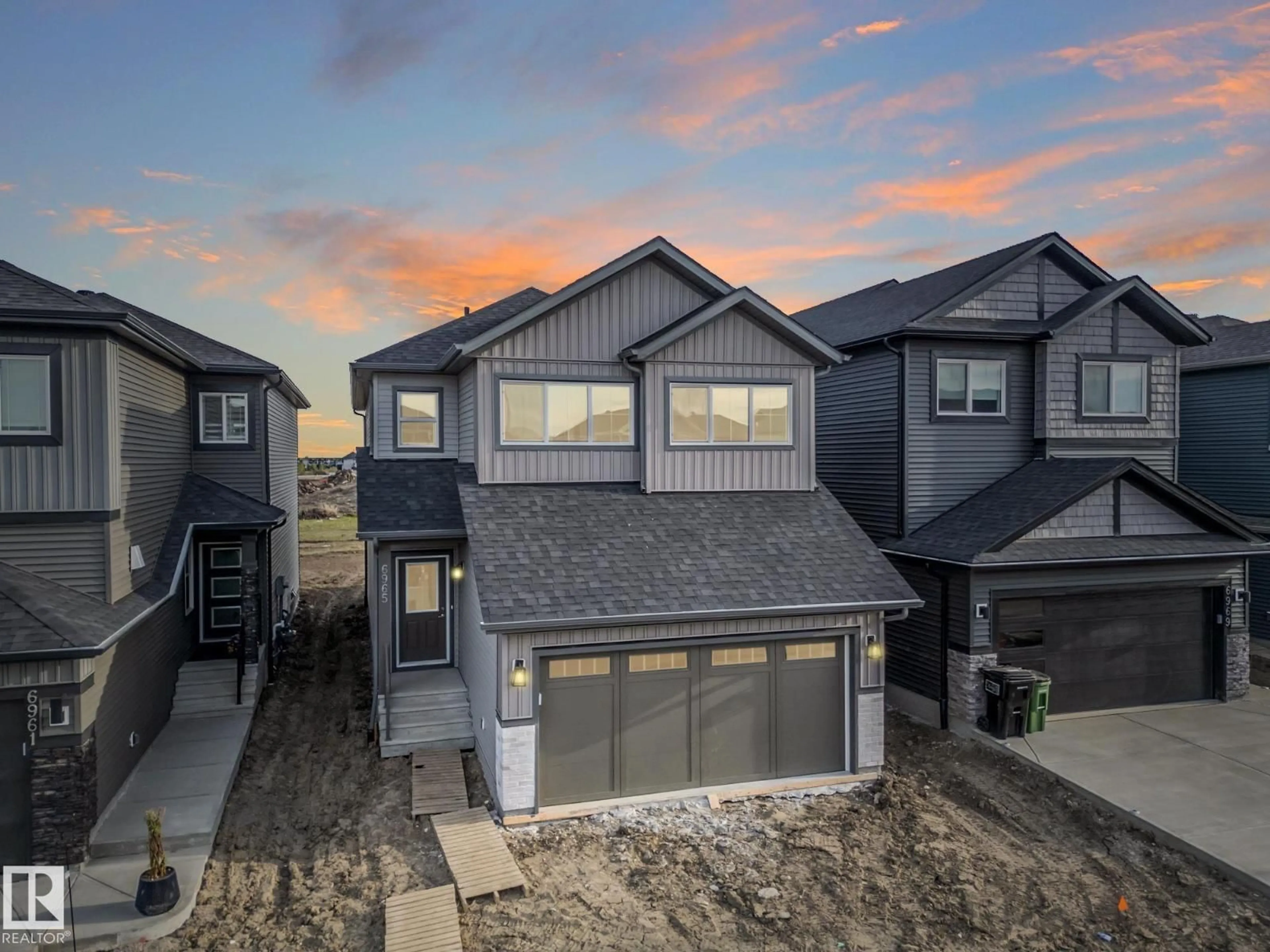 A pic from outside/outdoor area/front of a property/back of a property/a pic from drone, street for 6965 176A AV, Edmonton Alberta T5Z0X8