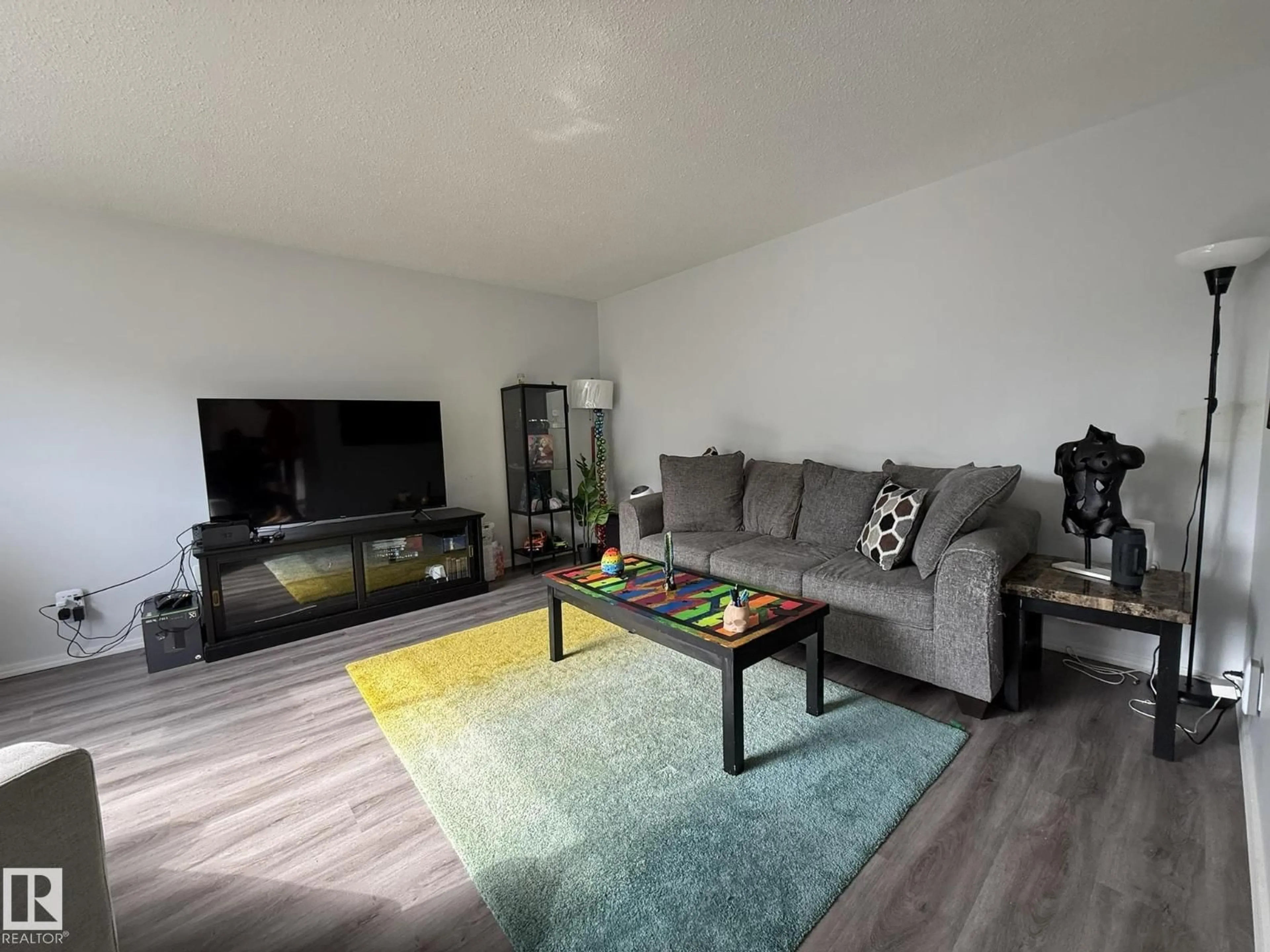 Living room with furniture, unknown for NW - 166 ROSELAND VG, Edmonton Alberta T5E5R6