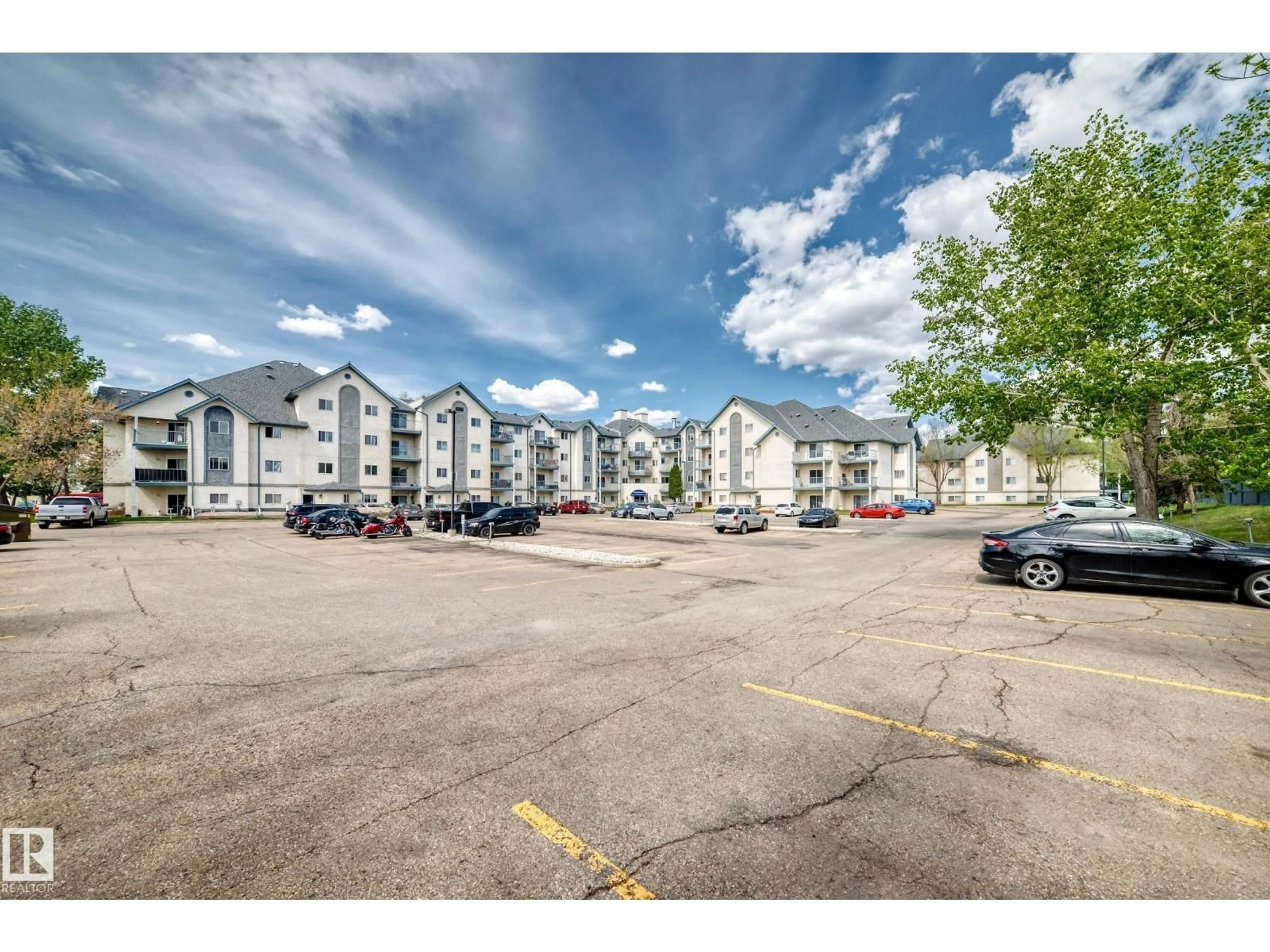 A pic from outside/outdoor area/front of a property/back of a property/a pic from drone, street for #306 - 2508 50 ST, Edmonton Alberta T6L6X9