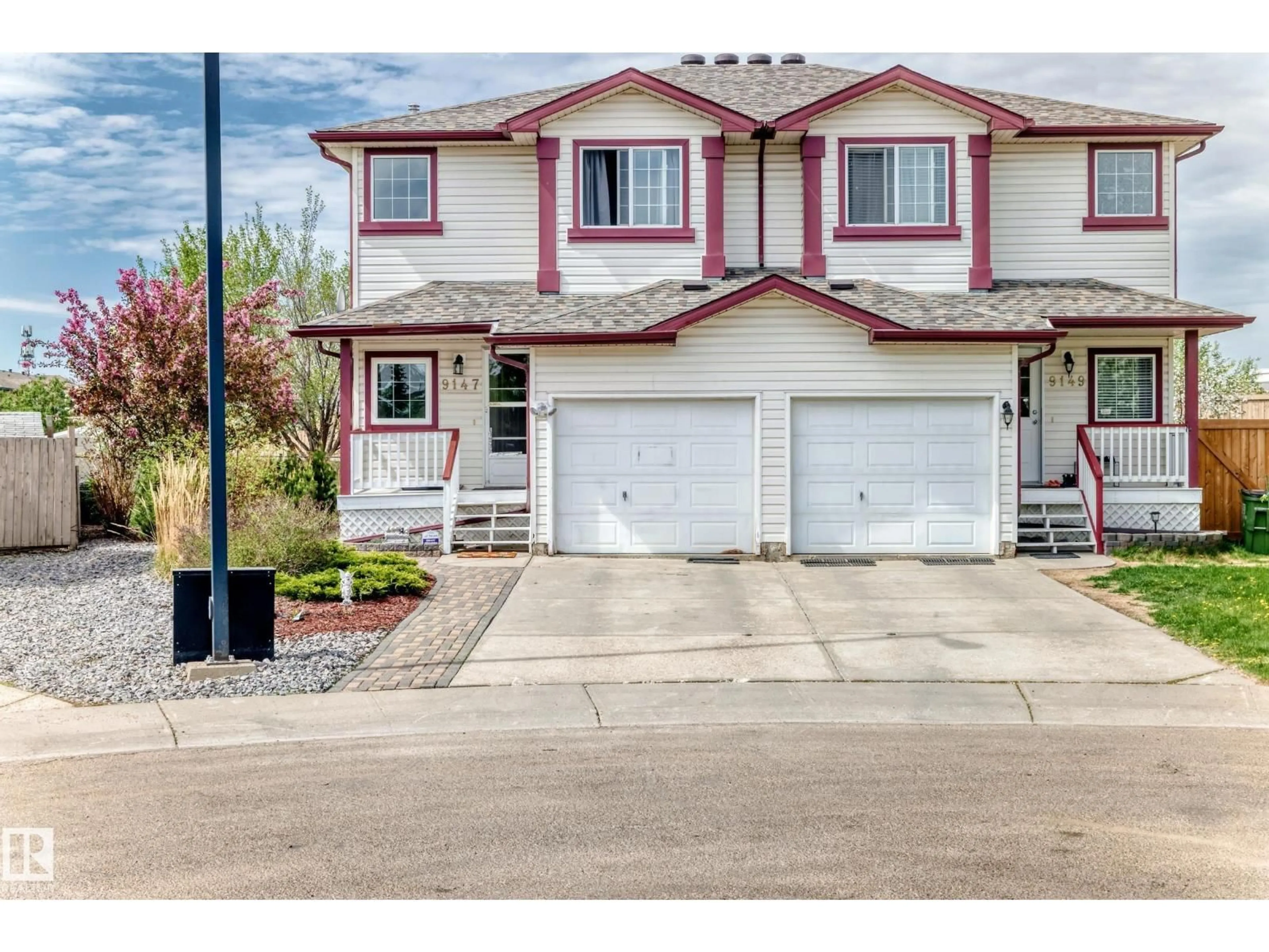 Home with vinyl exterior material, street for 9147 165 AV, Edmonton Alberta T5Z3H7