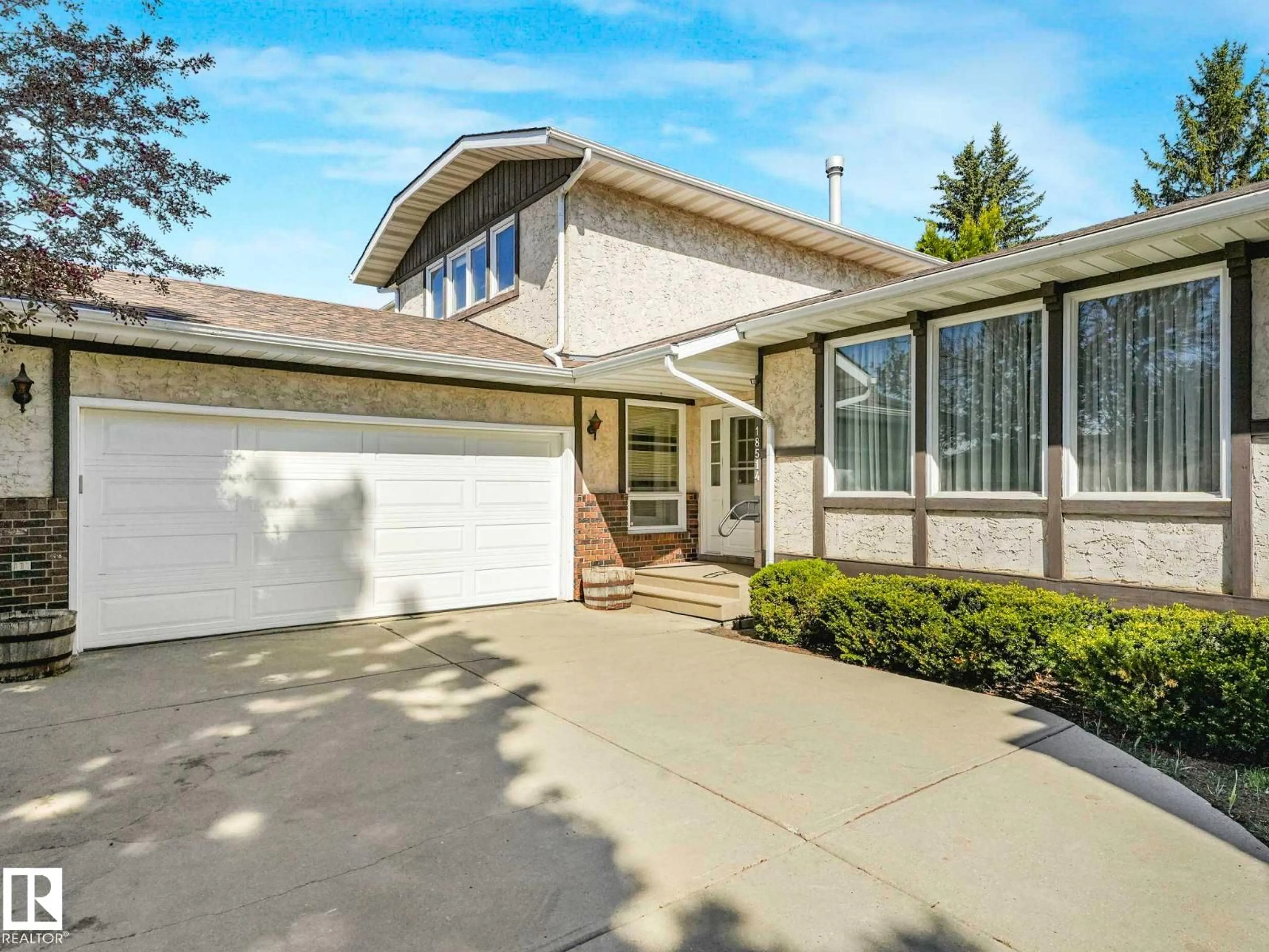 Home with vinyl exterior material, street for 18514 86A AV, Edmonton Alberta T5T1J6