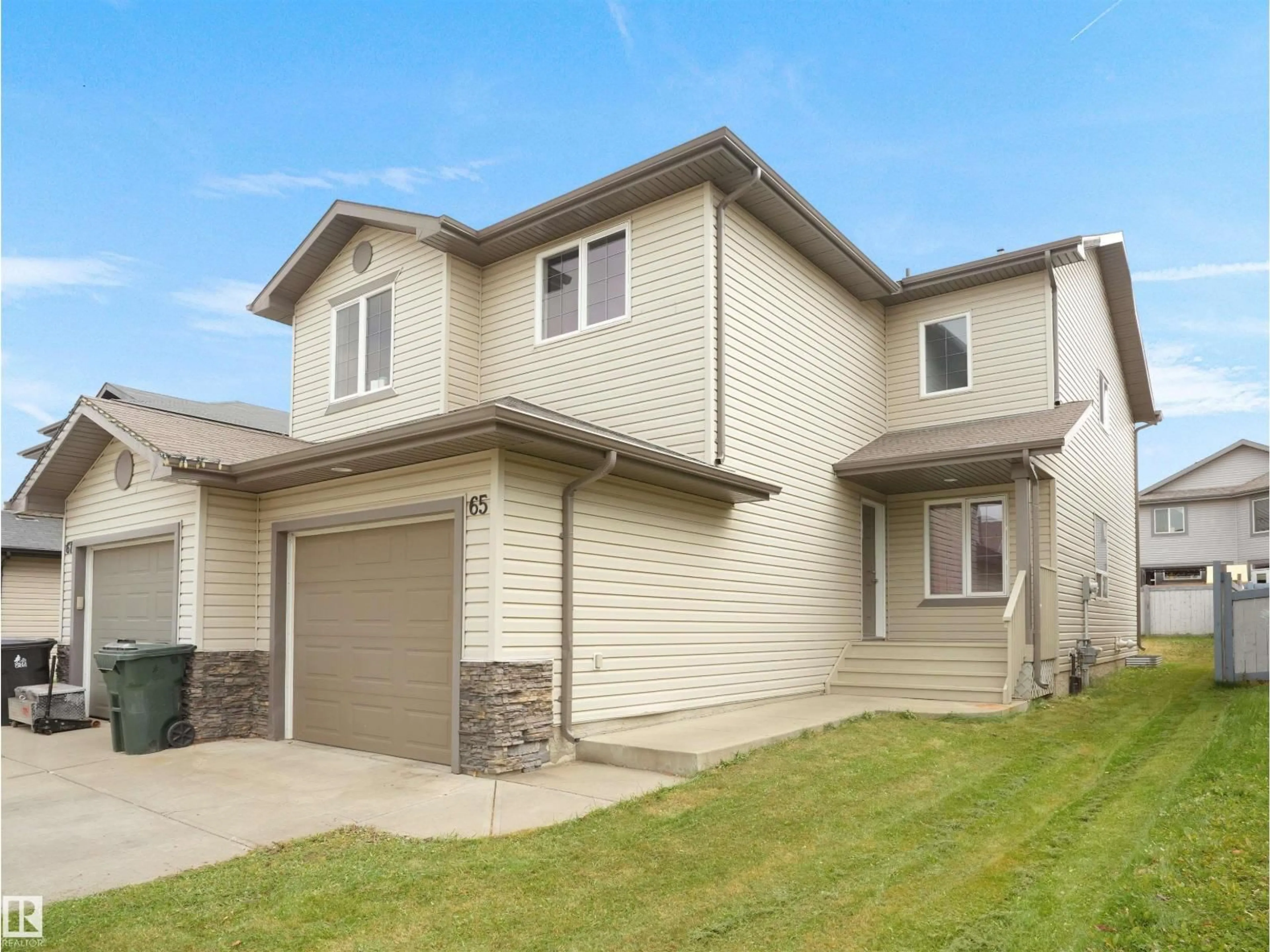 Home with vinyl exterior material, street for 65 ASHBY GD, Spruce Grove Alberta T7X0K1