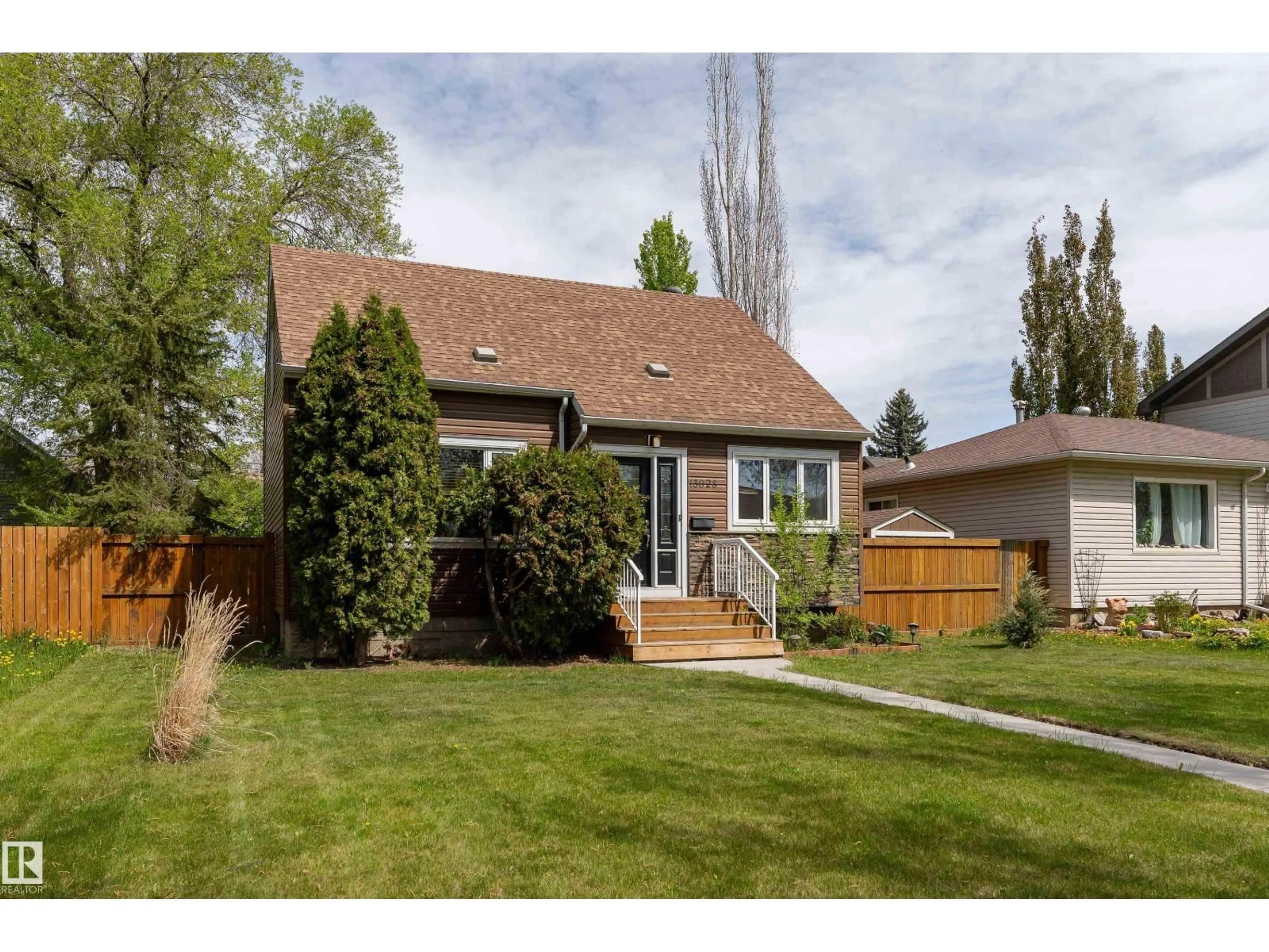 Home with brick exterior material, street for NW - 13028 123A AV, Edmonton Alberta T5L2Y9