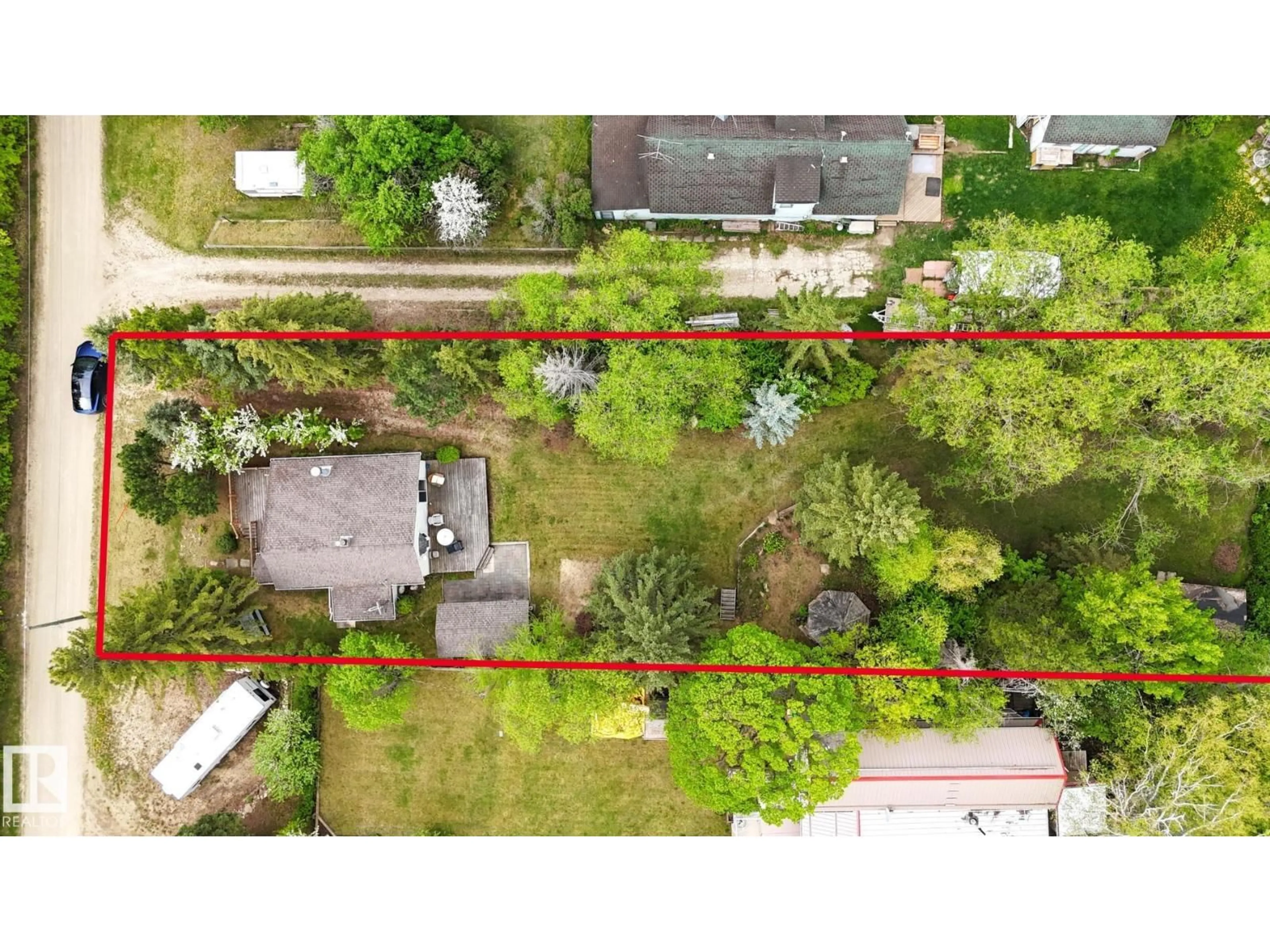 A pic from outside/outdoor area/front of a property/back of a property/a pic from drone, street for 56 - 4521 LAKESHORE RD, Rural Parkland County Alberta T0E2K0