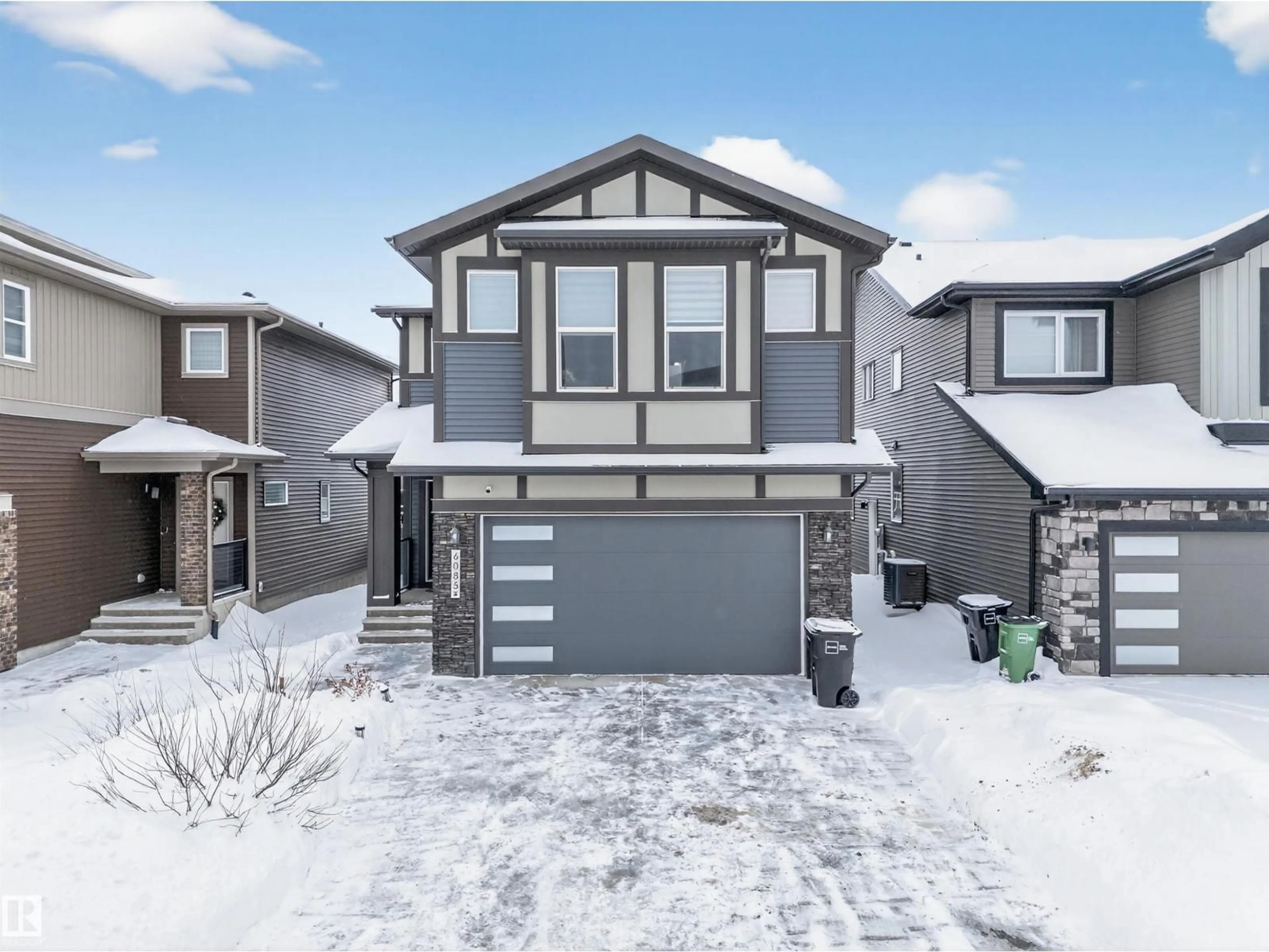 Home with vinyl exterior material, street for 6085 KING LD, Edmonton Alberta T6W3Z7